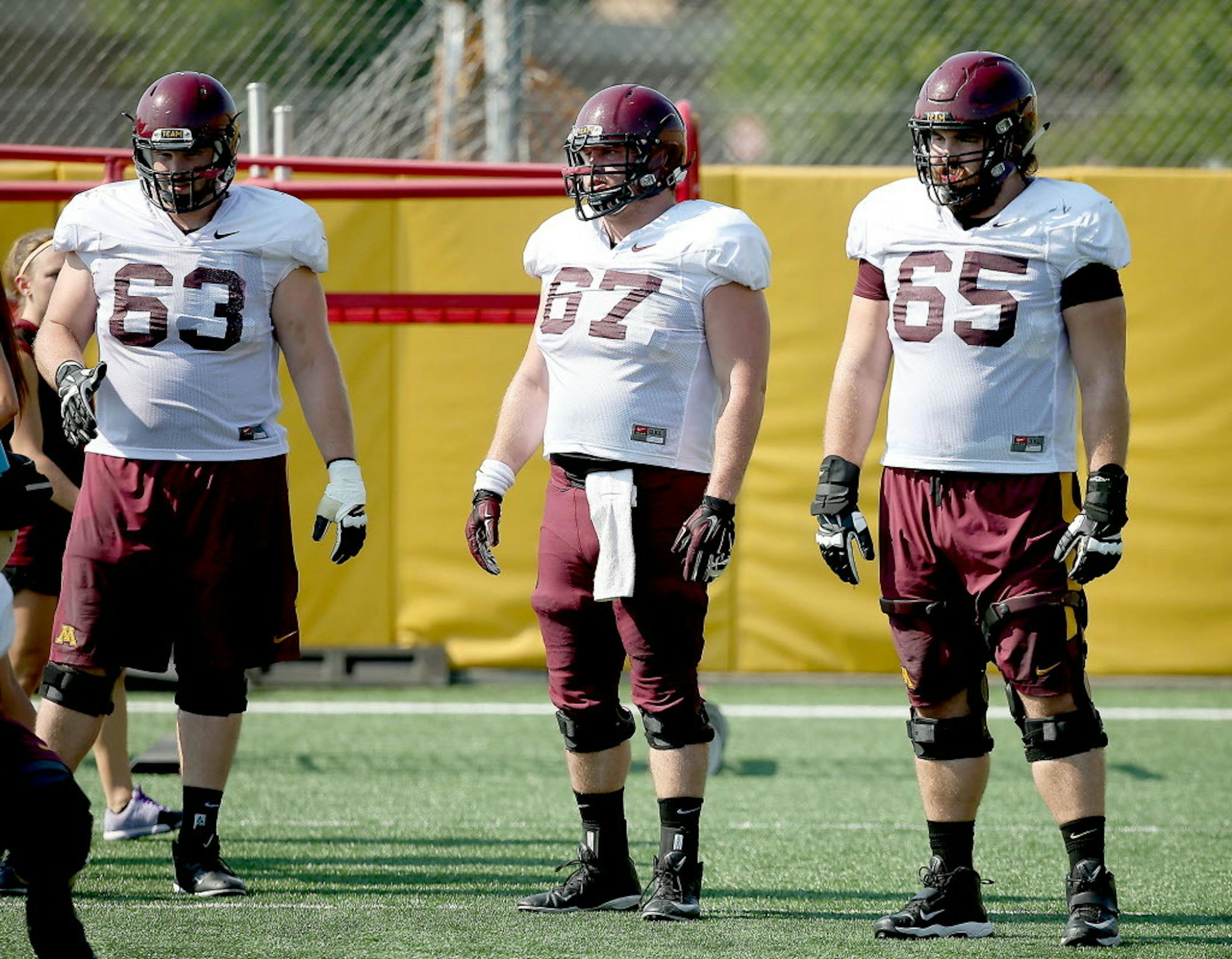Minnesota's Jon Christenson, left, Brian Bobek, center, and Josh Campion, worked through drills during practice, Friday, August 14, 2015 at Nagursk field at the U of M in Minneapolis, MN. ] (ELIZABETH FLORES/STAR TRIBUNE) ELIZABETH FLORES � eflores@startribune.com