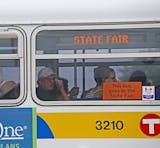 Fair goers made their way to the new bus transportation hub at the Minnesota State Fair, Sunday, August 24, 2014 in Falcon Heights, MN. ] (ELIZABETH FLORES/STAR TRIBUNE) ELIZABETH FLORES &#xa5; eflores@startribune.com