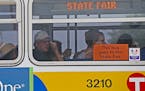 Fair goers made their way to the new bus transportation hub at the Minnesota State Fair, Sunday, August 24, 2014 in Falcon Heights, MN. ] (ELIZABETH F
