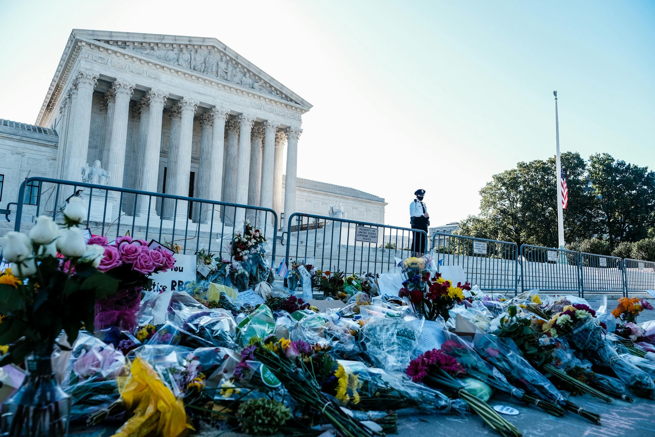 Flowers outside of the Supreme Court in Washington, Monday, Sept. 21, 2020, honor the life of the late Supreme Court Justice Ruth Bader Ginsburg. (Michael A. McCoy/The New York Times)