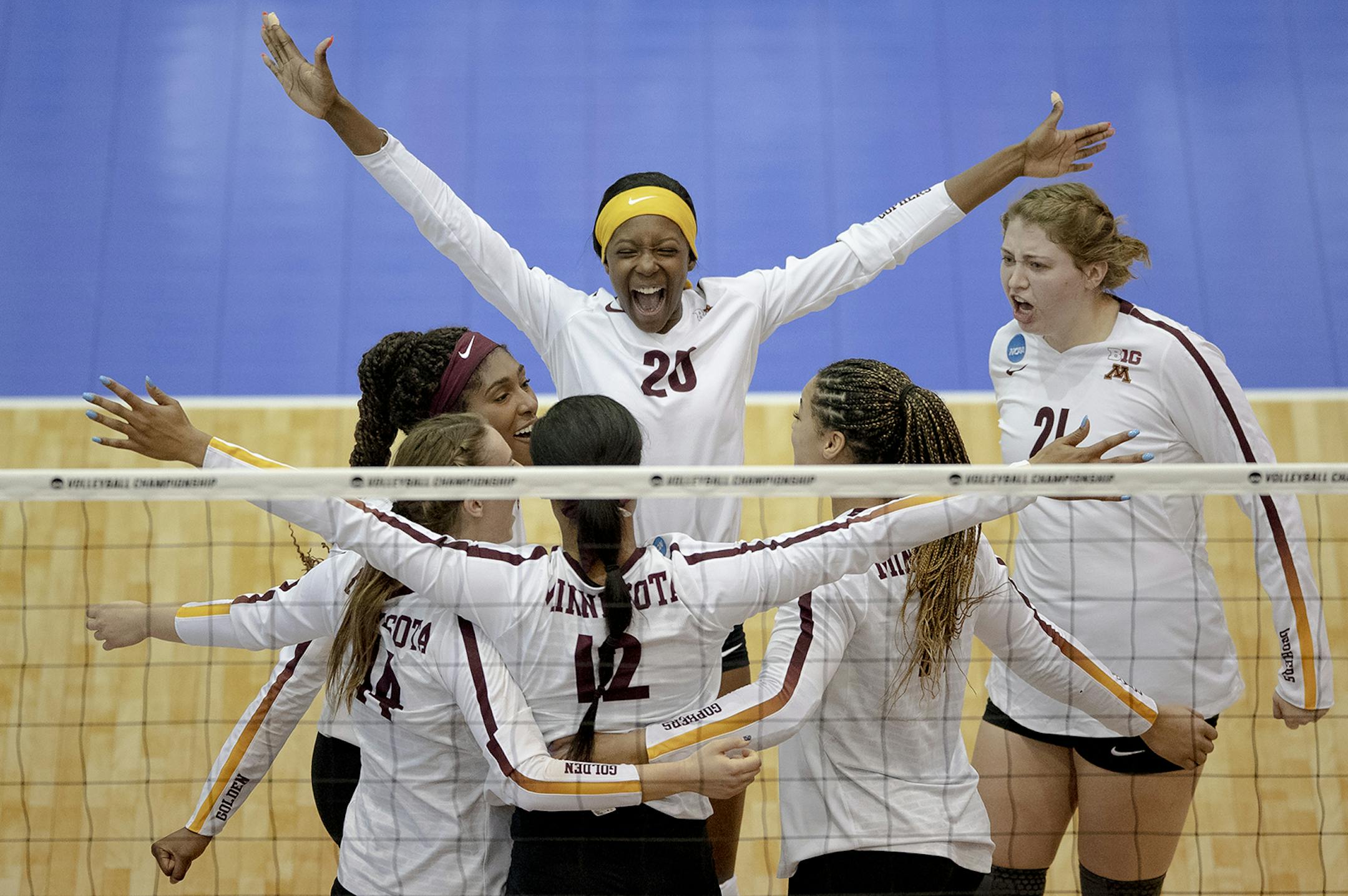 Minnesota outside hitter Adanna Rollins (20) celebrated a block by middle blocker Taylor Morgan (12) during a match against Louisville in the fourth round of the NCAA volleyball tournament on Saturday, Dec. 14, 2019, in Austin, Texas. (Nick Wagner/Special to the Star Tribune)