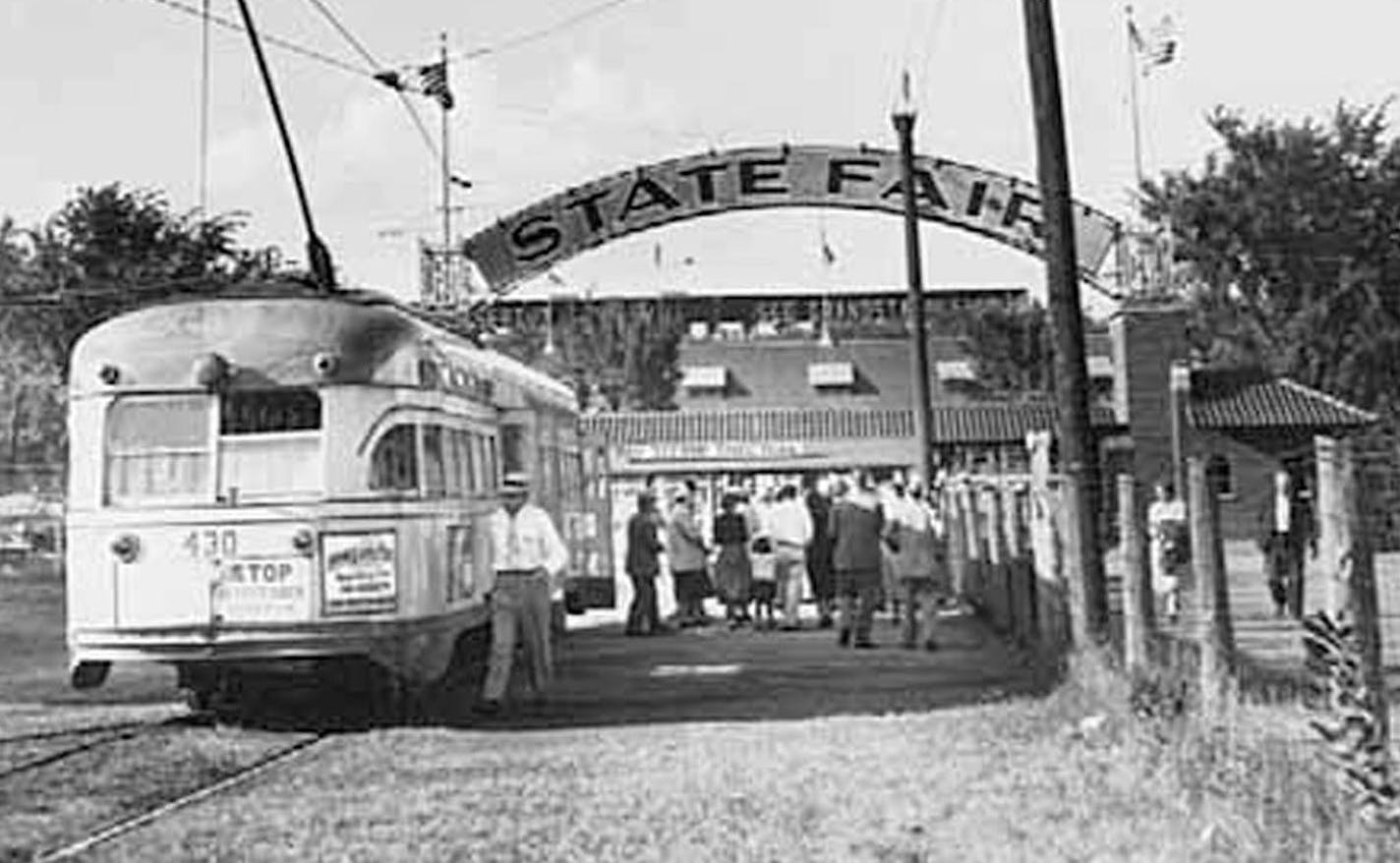 The graceful metal arched sign that welcomed visitors to the Minnesota State Fair as they stepped off streetcars was already 20 years old in 1953 when this photo was taken. In 2013, the sign, lost for 30 years, is being refurbished and plans call for it to grace the newly revitalized Heritage Square exhibit nest year.