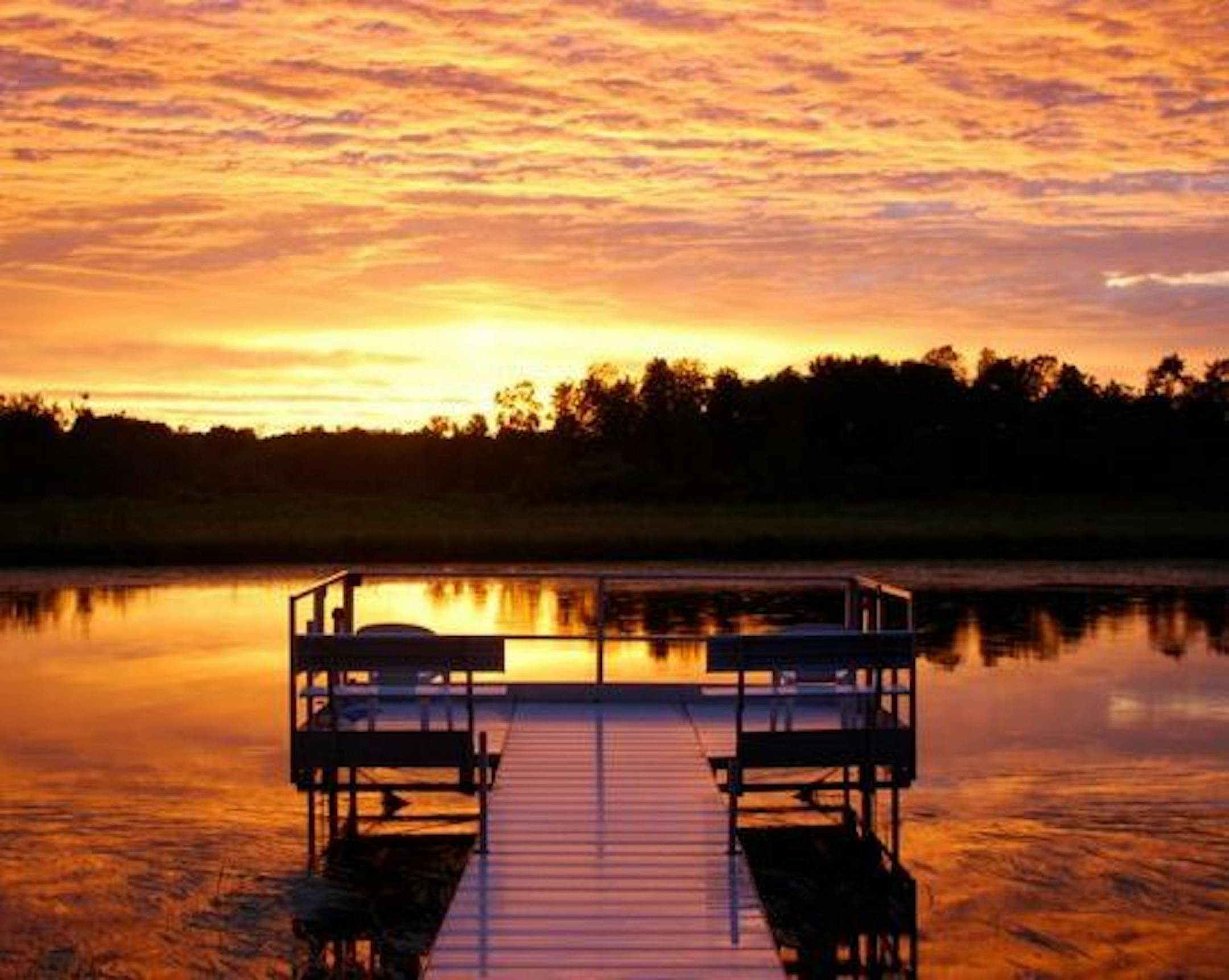 The dock at the Kujawa family cabin has served as gathering spot for three generations.