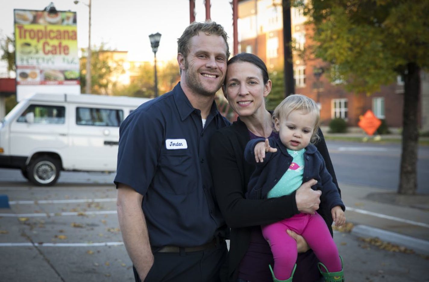 Jordan and Crystal Frank-Shannon and their daughter Ivy posed for a photo at their three month old business VanGo Auto that is an auto repair shop and VW Campervan rental business on West Seventh Street in St. Paul, Minn., on Thursday, October 12, 2017. They are concerned the construction of the proposed streetcar along Seventh Street would negatively effect their new business.