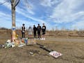 Friends of Garrett Bumgarner, who died in car crash March 13 in Woodbury, gathered at the scene of the crash on Settlers Ridge Parkway. Bumgarner was 