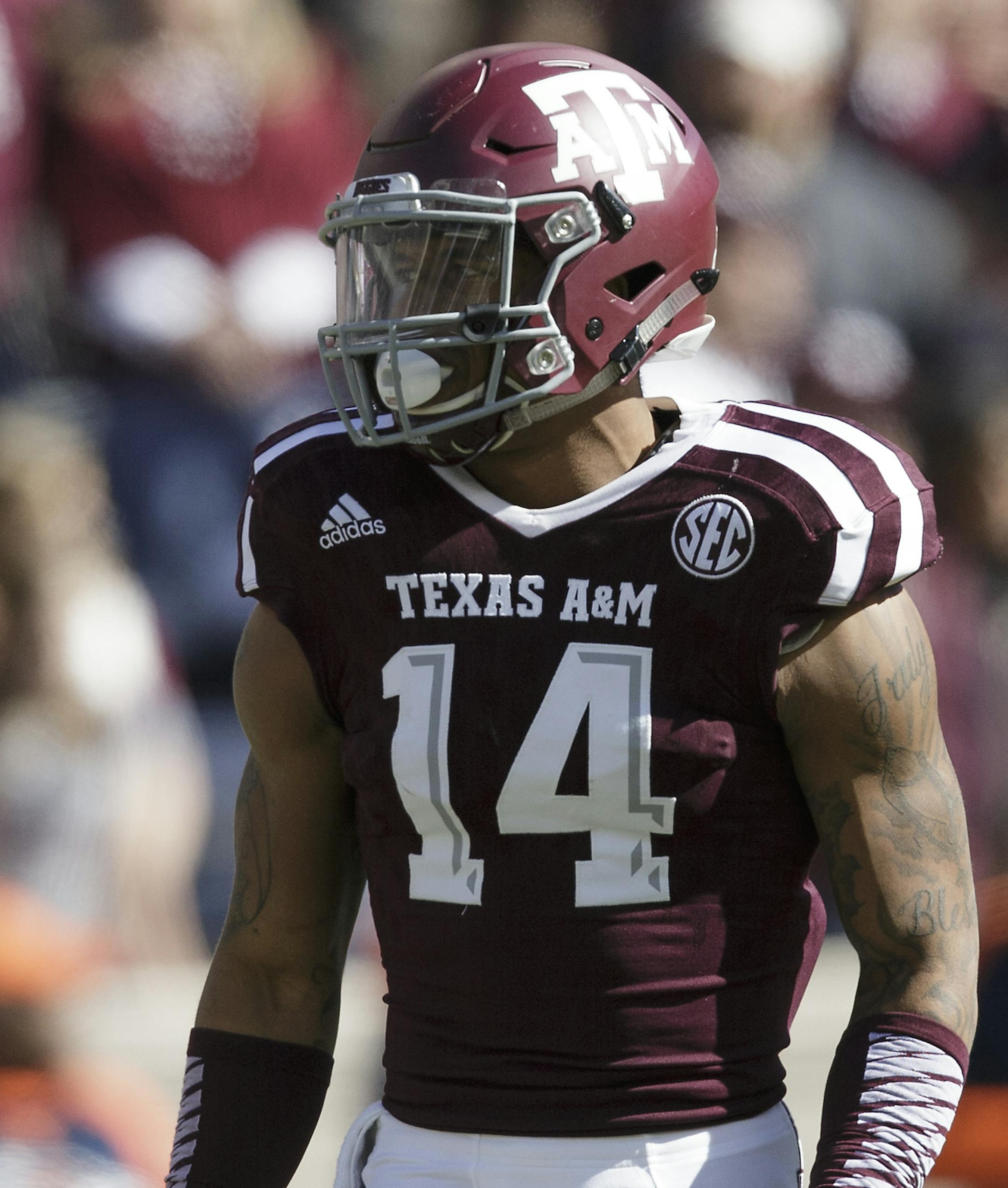 Texas A&M defensive back Justin Evans (14) looks towards the line of scrimmage during the first quarter of an NCAA college football game against UTSA Saturday, Nov. 19, 2016, in College Station, Texas. (AP Photo/Sam Craft) ORG XMIT: OTKTXSC121