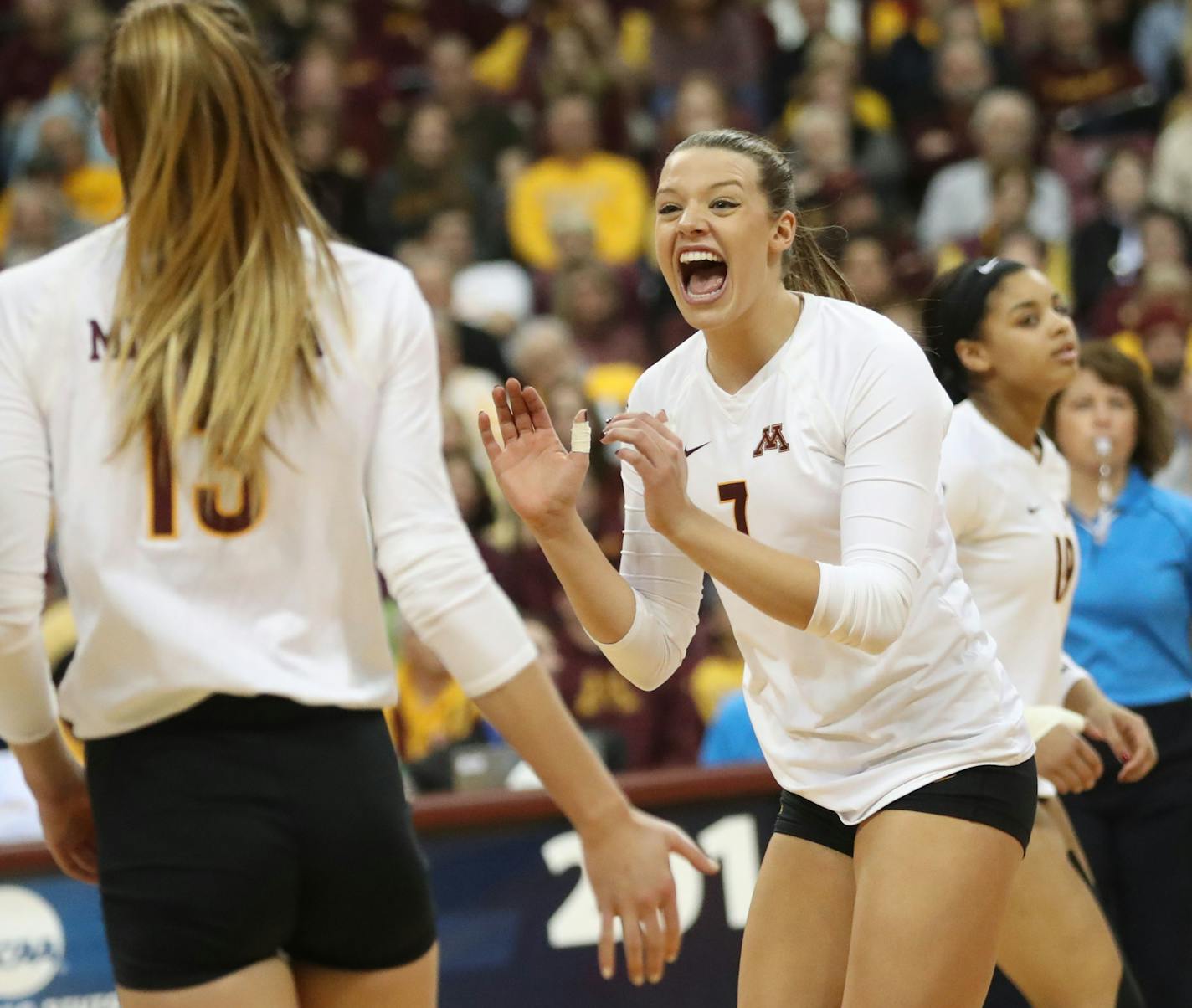 The University of Minnesota's Hannah Tapp (7) celebrates a point with teammate Molly Lohman (13) during the third set against the University of North Dakota in the first round of the NCAA volleyball tournament at the Sports Pavilion on the University of Minnesota campus Friday, Dec. 2, 2016, in Minneapolis, MN. Minnesota beat North Dakota 3 sets to 0.] (DAVID JOLES/STARTRIBUNE)djoles@startribune.com NCAA volleyball tournament coverage