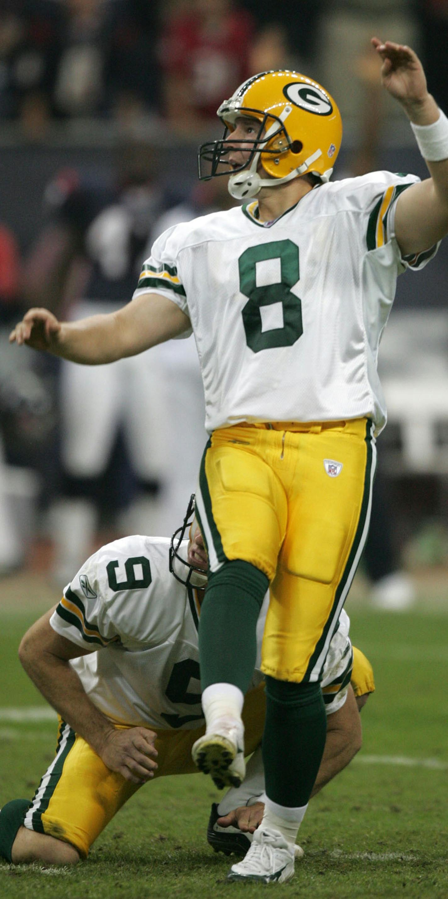 Green Bay Packers kicker Ryan Longwell (8) watches his game-winning 46-yard field goal to beat the Houston Texans as time expires, Sunday, Nov. 21, 2004, in Houston. The Packers won 16-13. (AP Photo/David J. Phillip) ORG XMIT: HTT108