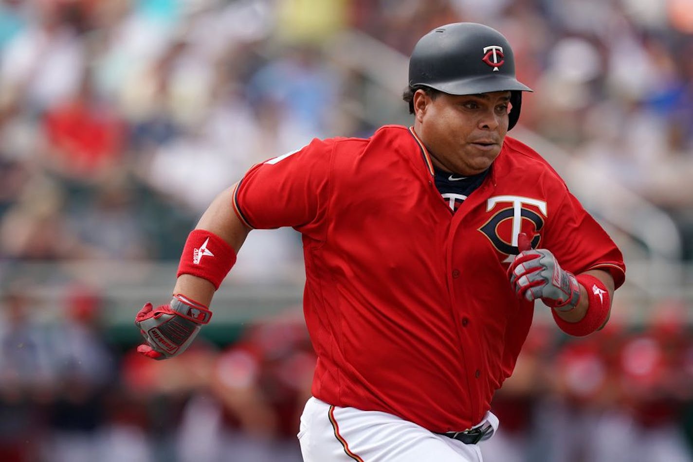 Minnesota Twins catcher Willians Astudillo sprinted down the first base line after he connected with the ball during Monday's game against the Baltimore Orioles.