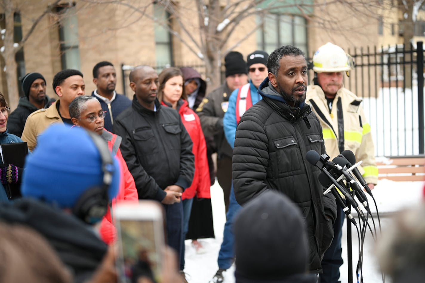 Minneapolis City Councilman Abdi Warsame addressed the media outside the building at 630 Cedar Avenue where an early morning fire claimed five lives Wednesday.