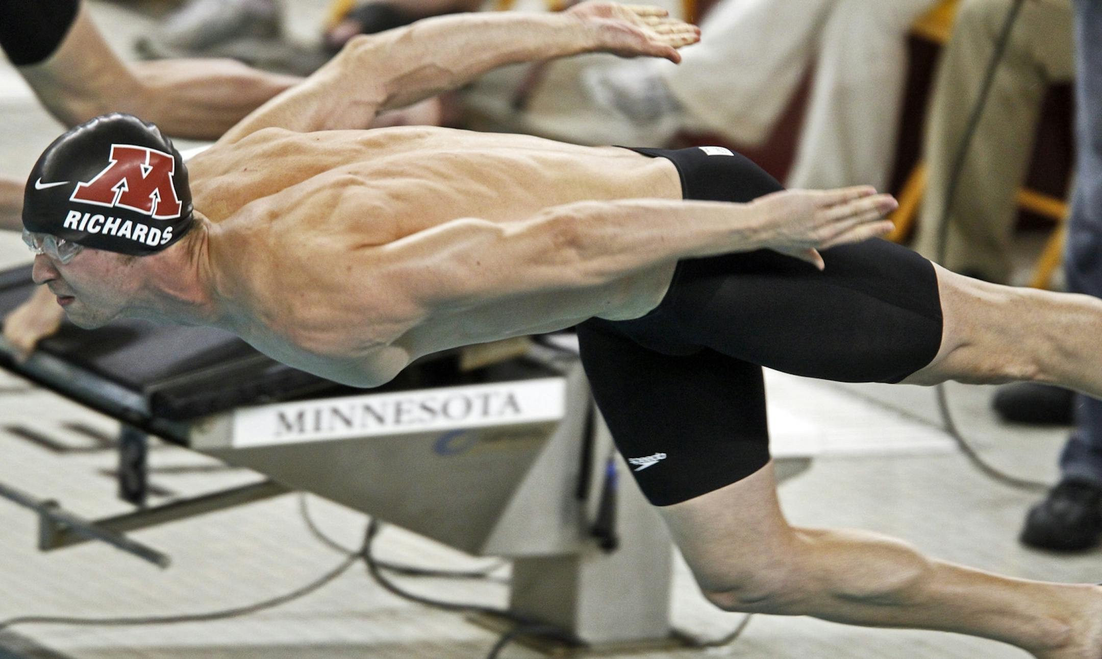 Minnesota's Michael Richards at the start of the Championship Final of the Mens 100 Yard Freestyle race which he won.