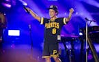 FILE - In this May 27, 2018 file photo, Bruno Mars performs at the Bottle Rock Napa Valley Music Festival at Napa Valley Expo in Napa, Calif. Cardi B 
