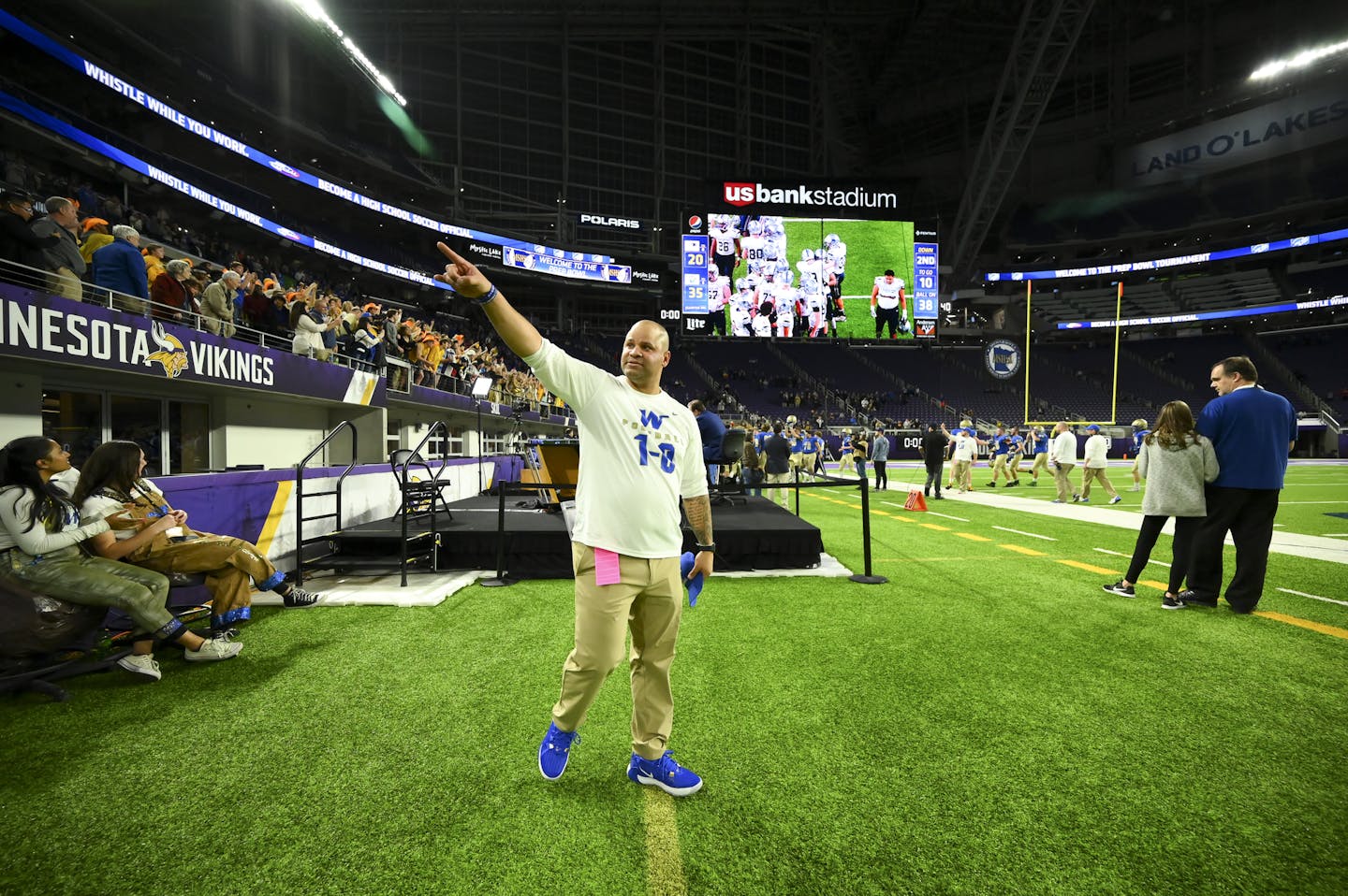 Wayzata head coach Lambert Brown saluted fans after his team won the state Class 6A title.