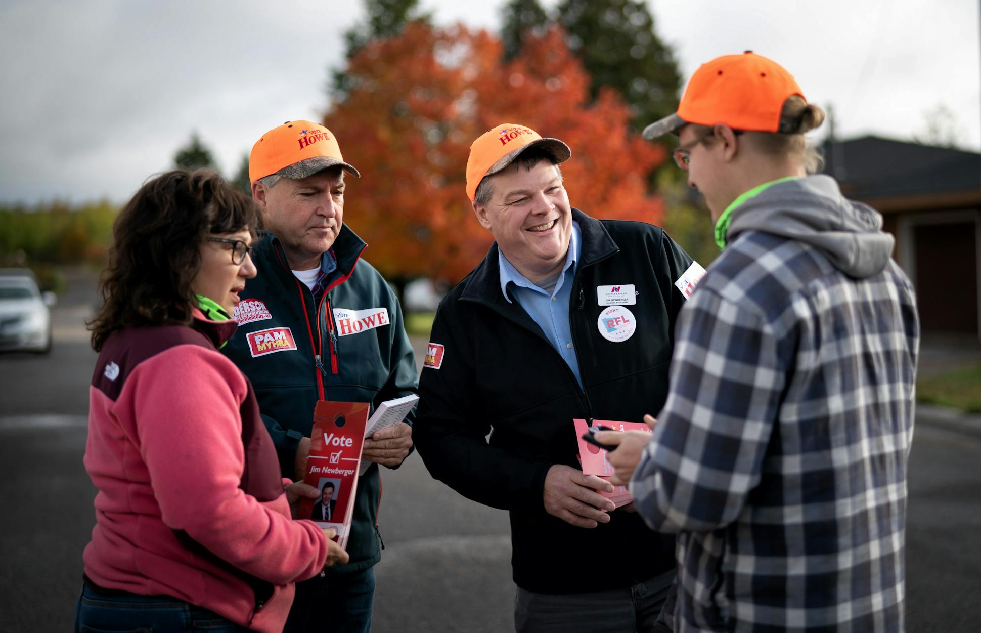 Newberger , Lt. Governor candidate Donna Bergstrom and secretary of state candidate John Howe talked with a local volunteer as they set out to door knock through Aurora, MN before heading to the next stop.
