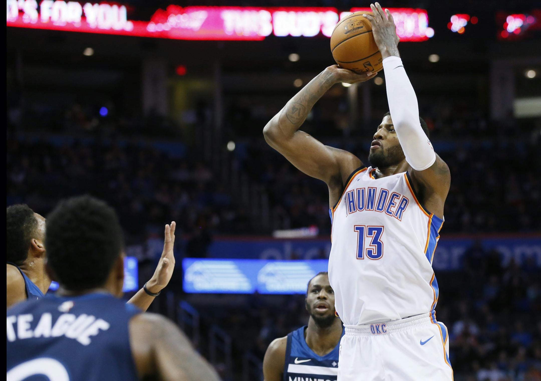 Oklahoma City Thunder forward Paul George (13) shoots against the Minnesota Timberwolves during the second quarter of an NBA basketball game in Oklahoma City, Friday, Dec. 1, 2017.