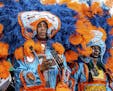 Members of the Black Feathers and Wild Tchoupitoulas Mardi Gras Indians perform at the New Orleans Jazz and Heritage Festival on Friday, May 3, 2019, 