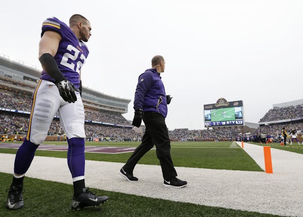 Vikings safety Harrison Smith walked back onto the sidelines in the second quarter after leaving the Seattle game because of an injury in the first qu