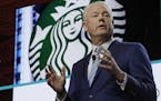 Starbucks CEO Kevin Johnson speaks Wednesday, March 20, 2019, at the company's annual shareholders meeting in Seattle. (AP Photo/Ted S. Warren)