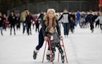 Neosha Thompson pushed her son Ivan, 4, around the Guidant John Rose Minnesota Oval on Wednesday as other skaters cruised behind.