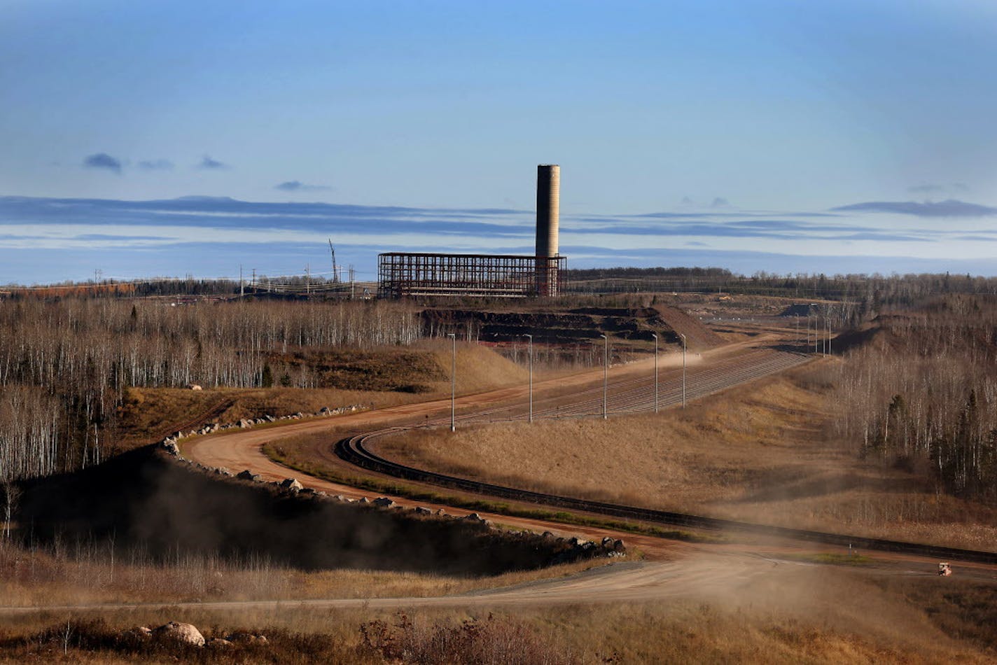 The stacks and the steel frame for the induration building are seen on the site of Essar Steel Minnesota's taconite mine project in Nashwauk, Minn. ] LEILA NAVIDI leila.navidi@startribune.com / BACKGROUND INFORMATION: Friday, October 31, 2014. Essar Steel Minnesota recently ramped up construction on an $1.8 billion taconite plant after securing the funding needed to complete the project. The plant endured several delays over the past two years as funds periodically ran dry and some contractors w