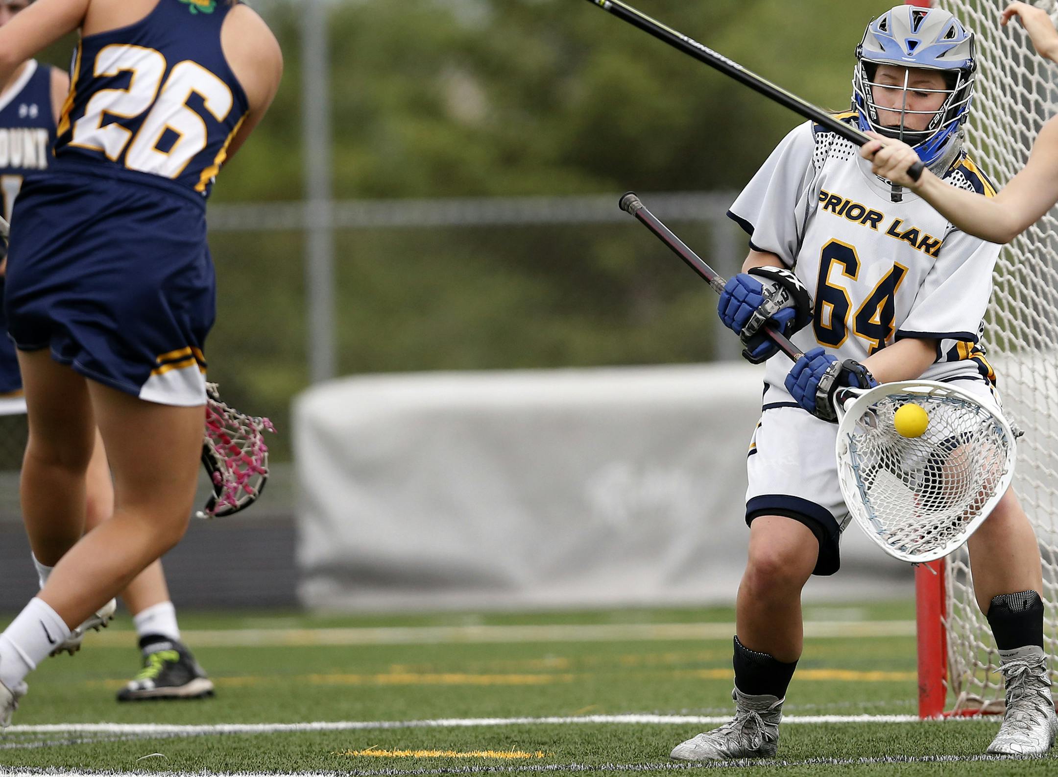 Prior Lake goalkeeper Claire Hagen (64) made a save in the first half. ] CARLOS GONZALEZ cgonzalez@startribune.com - May 23, 2016, Prior Lake, MN, Prior Lake High School / Prep girls' lacrosse. Prior Lake vs. Rosemount