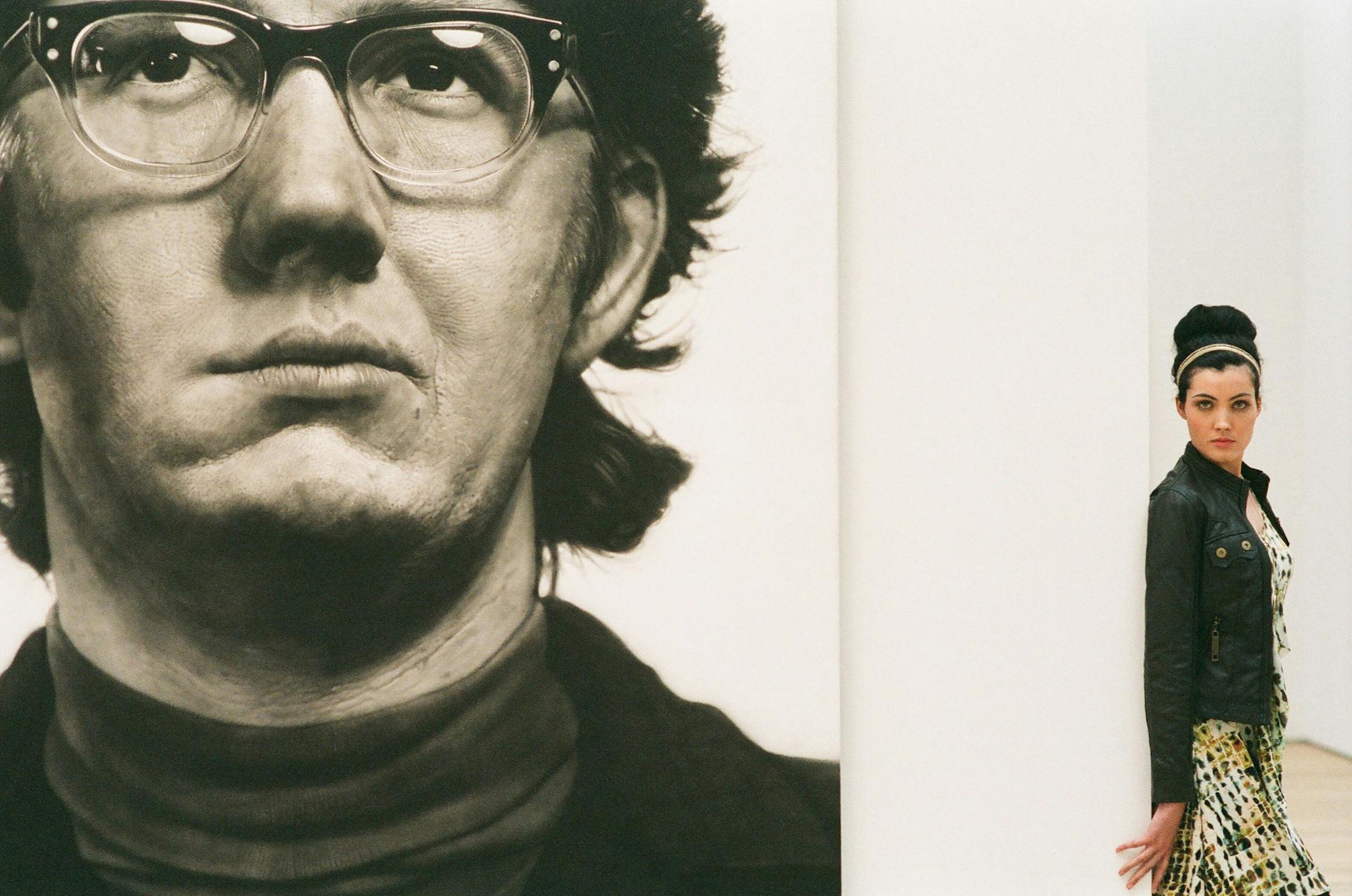 Molly stands in front of 'Keith,' 1970, by Chuck Close. She models Simply Vera by Vera Wang's Crocodile dress ($40.60) at Kohl's, www.kohls.com; wood and teal pendant necklace ($12) and brown faux leather jacket from Brave Soul ($48), both at Glik's, www.gliks.com; Deepa Gurnani headband ($45) at Ivy Hill, www.ivyhillboutique.com. (Erik M. Lunsford/St. Louis Post-Dispatch/MCT) ORG XMIT: 1143577