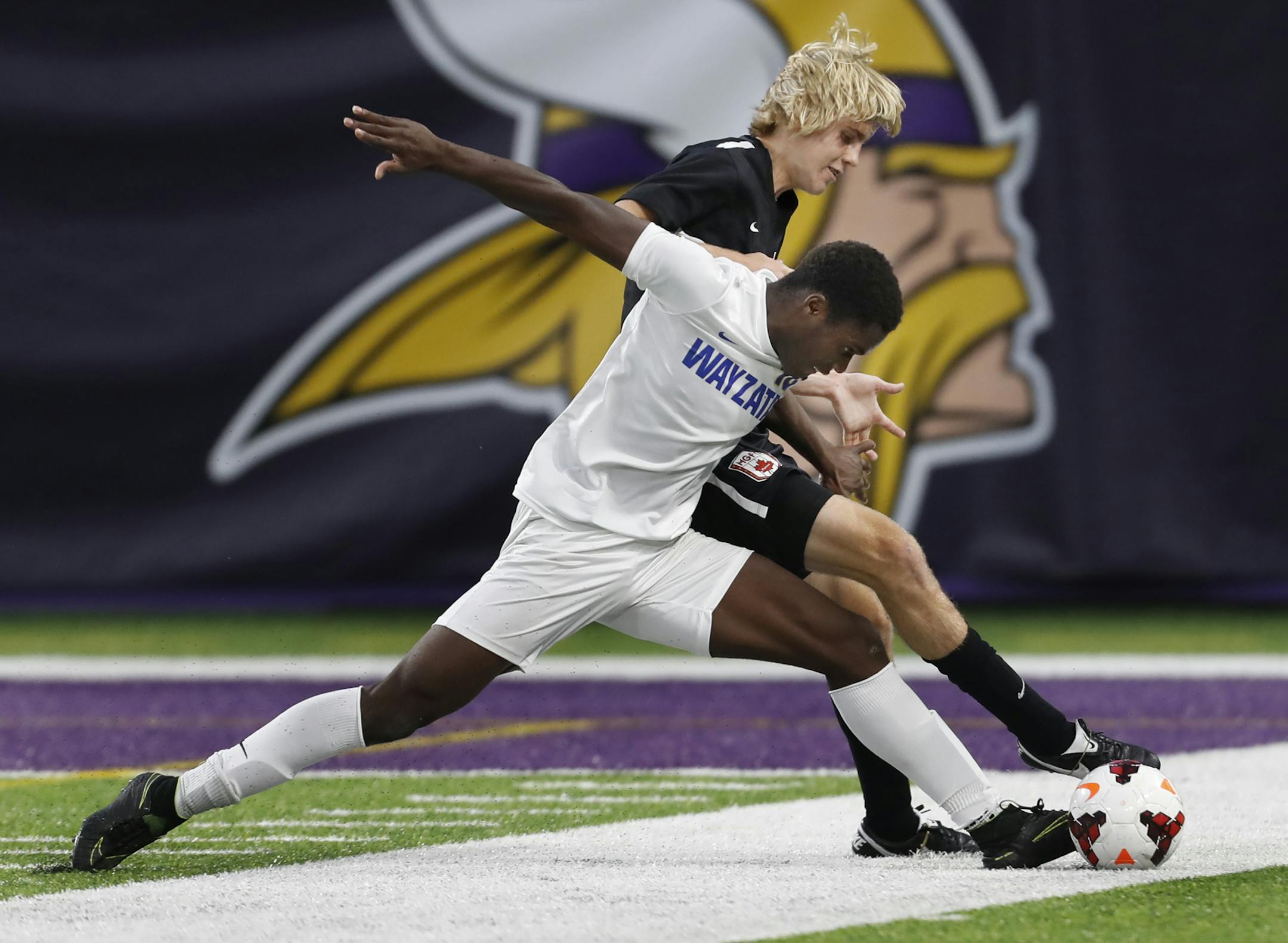 Patrick Weah(10) of Wayzata and Jack Gleckler(8) fight for control of the ball. ]Maple Grove vs Wayzata in Boys Class AA Seminal. Richard Tsong-Taatarii/Richard.tsong-taatarii@startribune.com