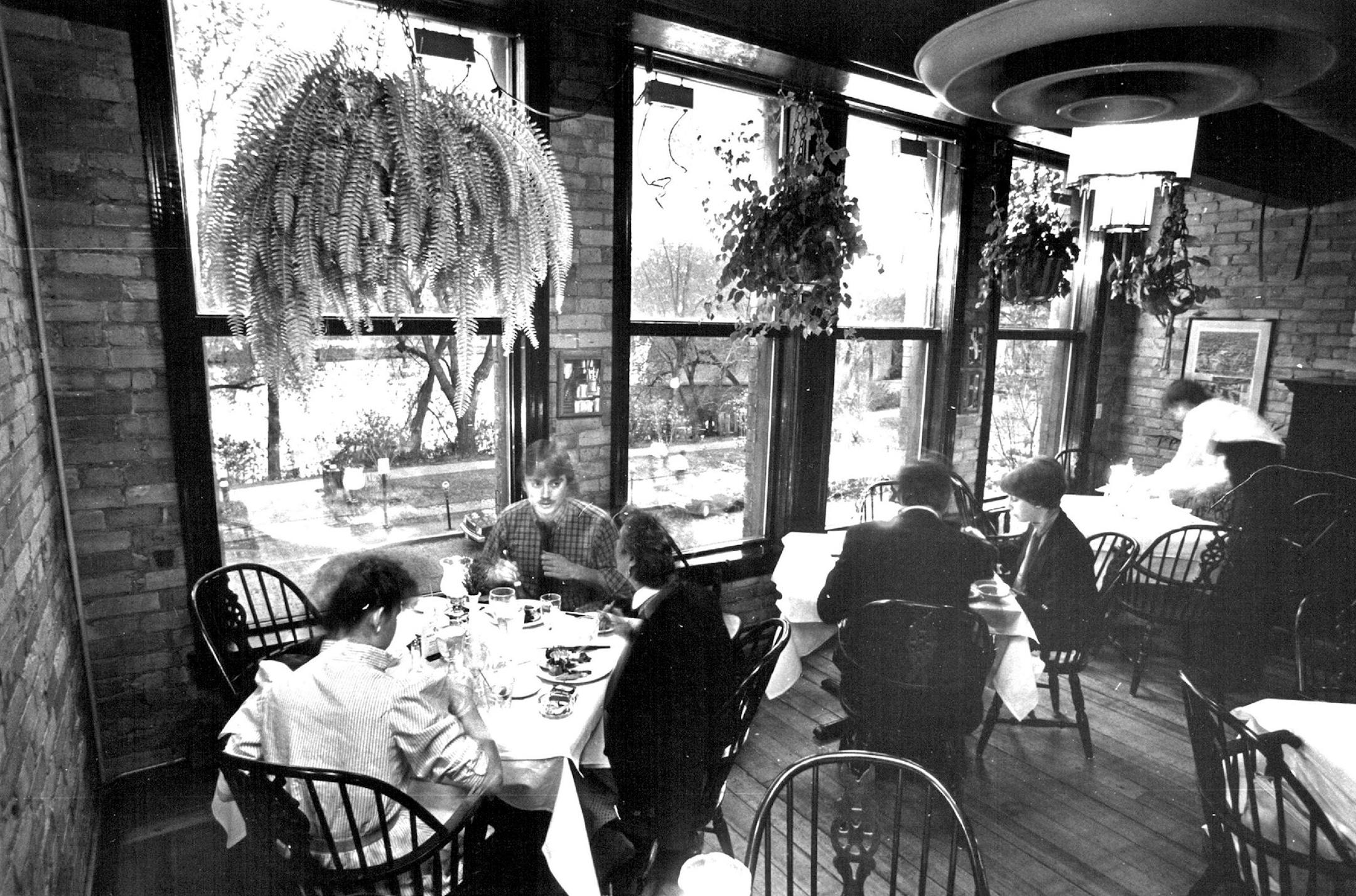 May 13, 1983 There are approcimately four romantic places to eat in the Twin Cities. Herman's 1890 is one of them. The Victorian steakhouse occupies the top floor of a one-time bar (some say whorehouse) that now houses Pracna on Main. Herman's has live piano music, tuxedoed waiters, green plants, a view of the river and a steak, salmon and salad menu. And atmosphere. Take a carnivore you love. May 9, 1983 David Brewster, Minneapolis Star Tribune ORG XMIT: MIN2015010711001063