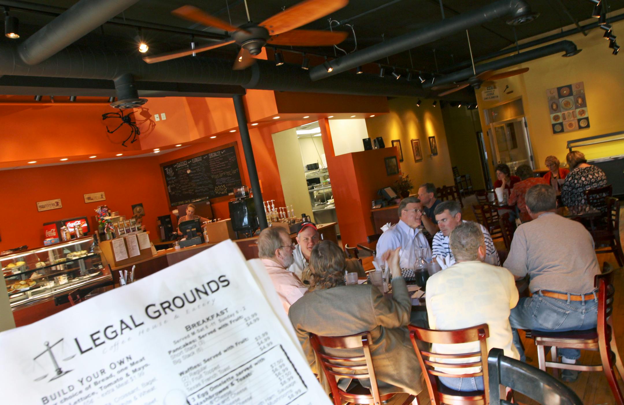 (left to right) The Legal Grounds Coffee Shop in downtown Anoka was started by Holly Brezinka with an inheritance from her father, the Late Hennepin County Judge James Johnston.