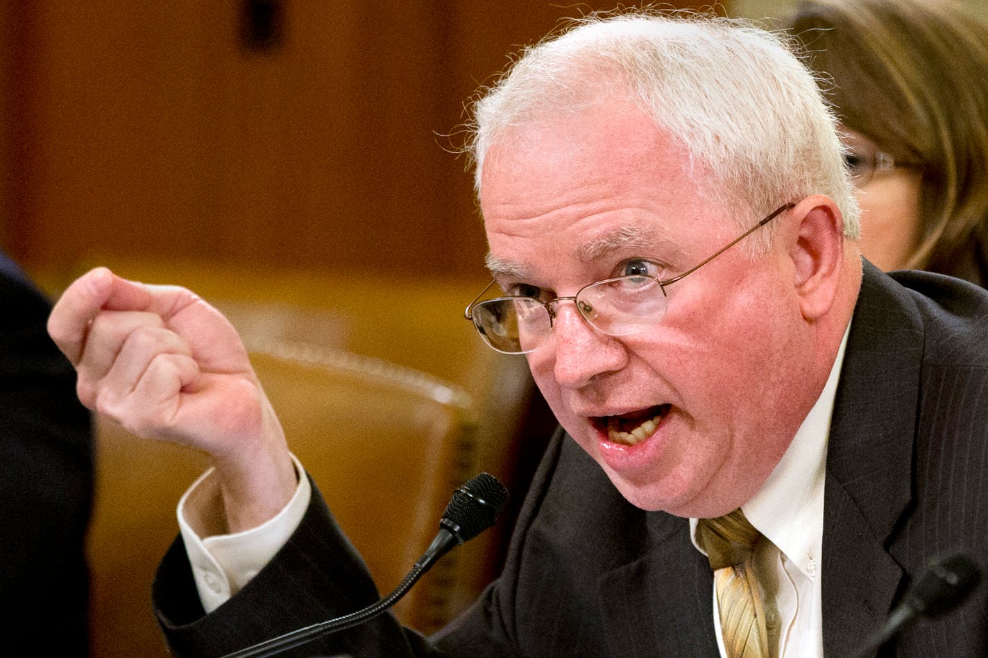 FILE - John Eastman, chairman of the National Organization for Marriage, testifies on Capitol Hill in Washington, on June 4, 2013, before the House Ways and Means Committee hearing of organizations that say they were unfairly targeted by the Internal Revenue Service while seeking tax-exempt status. The State Bar of California says it is investigating Eastman, a lawyer for former President Donald Trump, for possibly breaking legal and ethical rules relating to the 2020 election. John Eastman is the former dean of the Chapman University law school in Southern California. He argued after the November 2020 election that former Vice President Mike Pence could overturn the election and keep Trump in power. Pence refused to do that and Trump left office. But since then, Eastman has been subpoenaed by a House committee investigating the Jan. 6 Capitol insurrection. (AP Photo/Jacquelyn Martin, File)