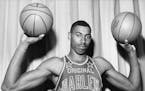 This is a 1959 photo showing Harlem Globetrotters WIlt Chamberlain. Patrick Reusse, at 13, witnessed Chamberlain's greatness when the 'Trotters visite