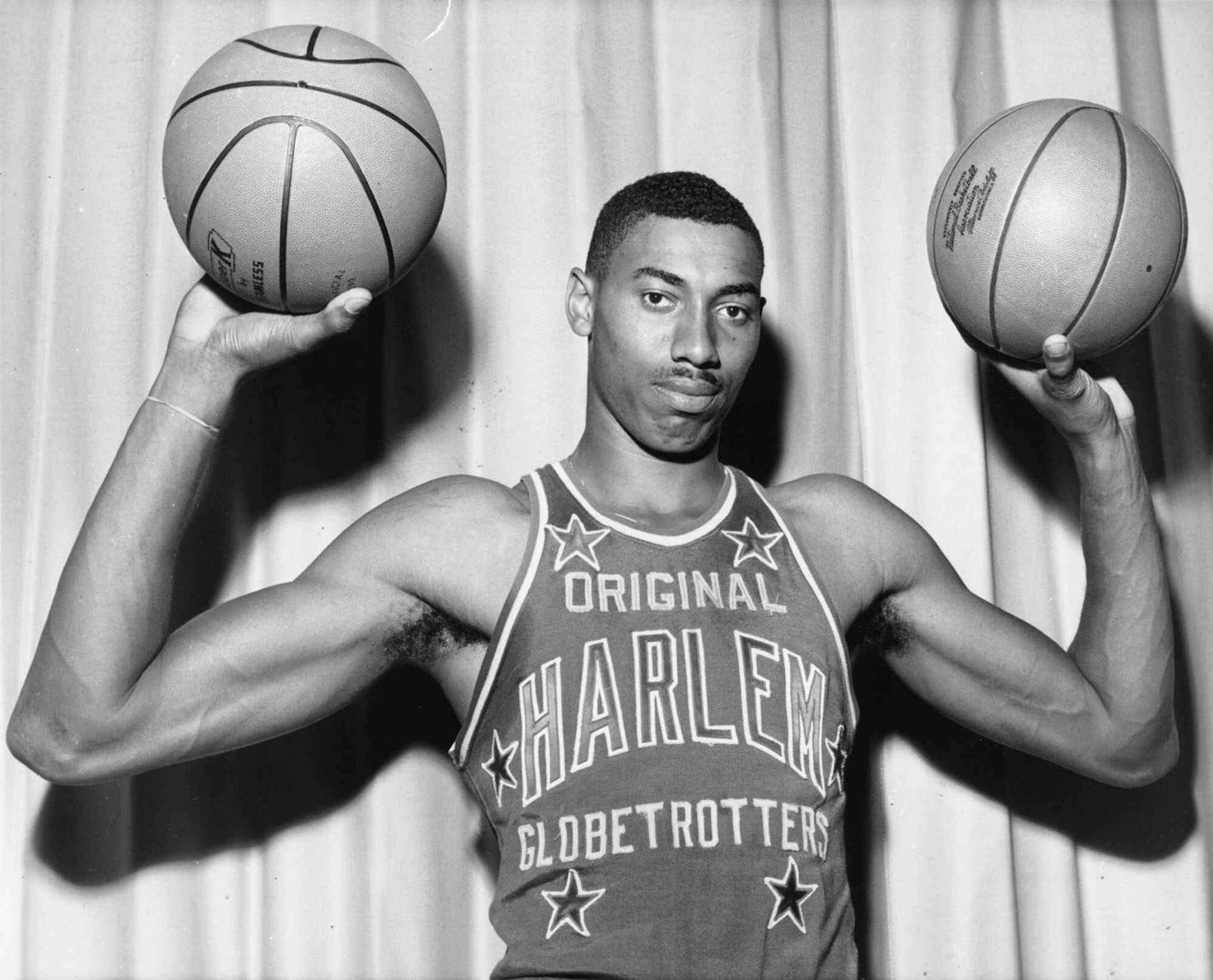 This is a 1959 photo showing Harlem Globetrotters WIlt Chamberlain. Patrick Reusse, at 13, witnessed Chamberlain's greatness when the 'Trotters visited Worthington that year.
