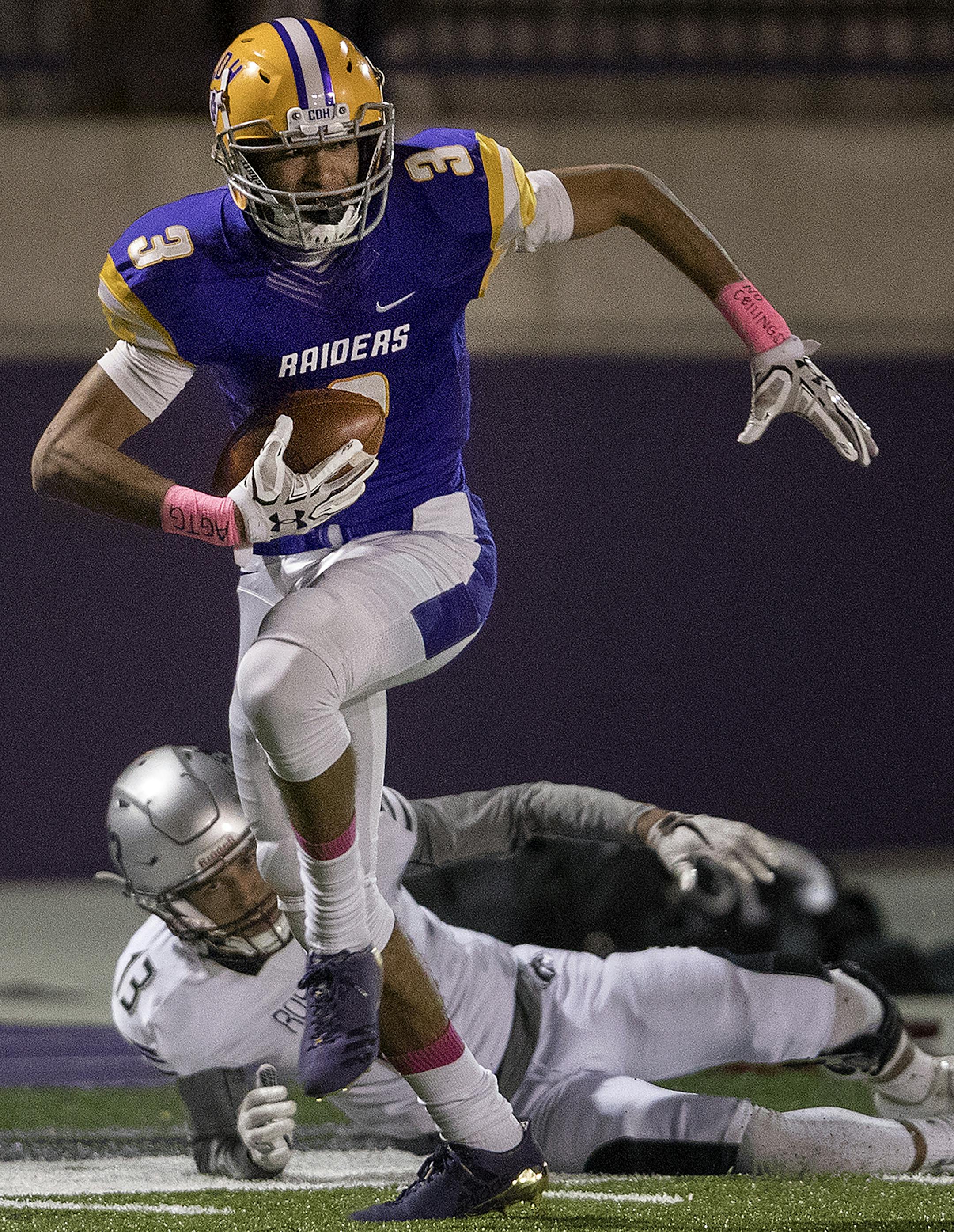 Peter Udoibok (3) of Cretin-Derham Hall broke away from Jaeveon Mottley (13) of Roseville during 59-yard touchdown catch and run in the first quarter. ] CARLOS GONZALEZ ï cgonzalez@startribune.com - October 18, 2017, St. Paul, MN, University of St. Thomas, High School/Prep Football, Roseville vs. Cretin-Derham Hall