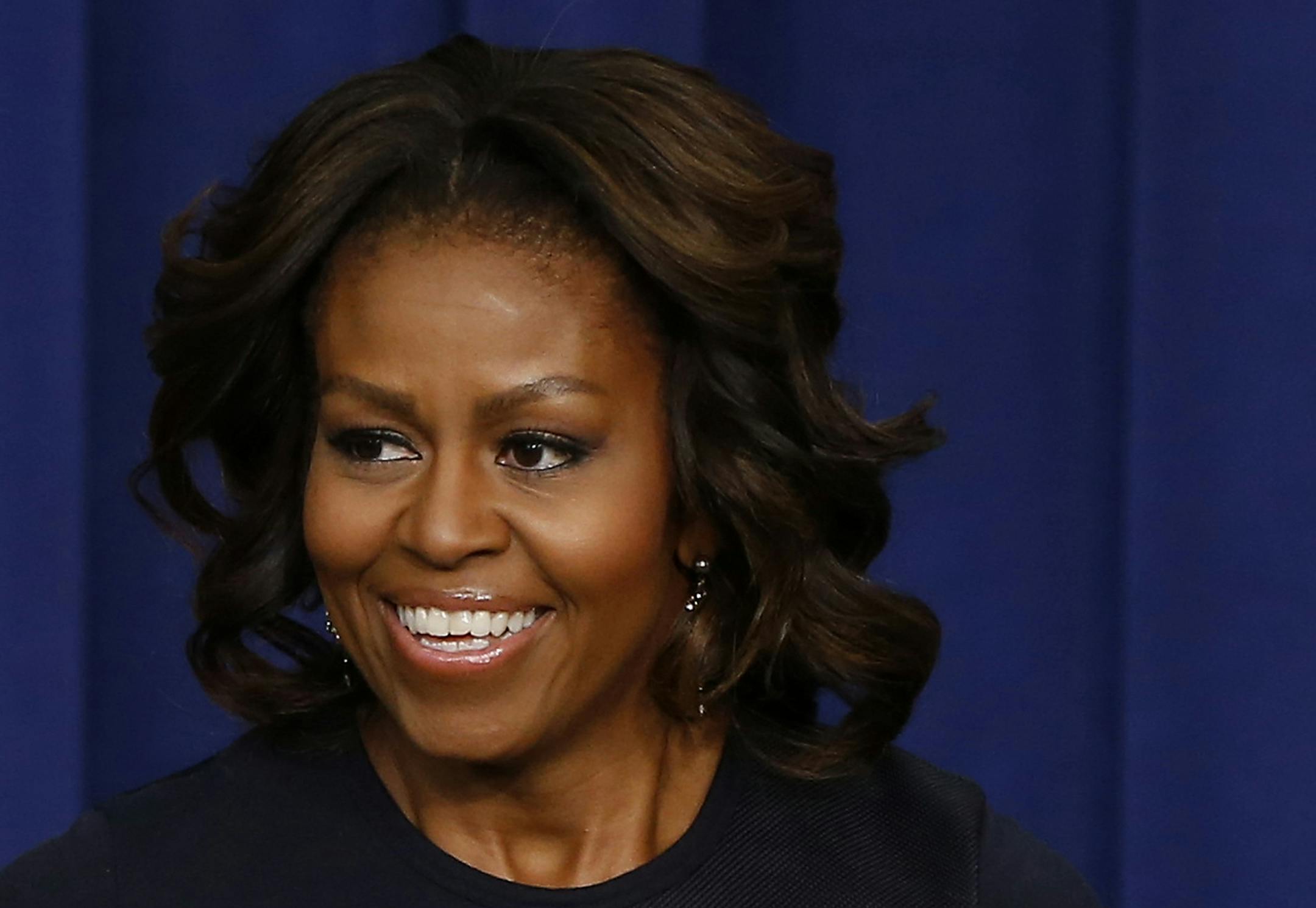 FILE - This Jan. 16, 2014 file photo shows first lady Michelle Obama in the Eisenhower Executive Office Building on the White House complex in Washington. Michelle Obama has a new partner in her campaign to get kids to eat more fruits and vegetables. The Subway sandwich chain will spend $41 million over three years to encourage them to eat more food that doesnít come from a box, the first lady announced Thursday at one of the Connecticut-based companyís restaurants just north of the Wh