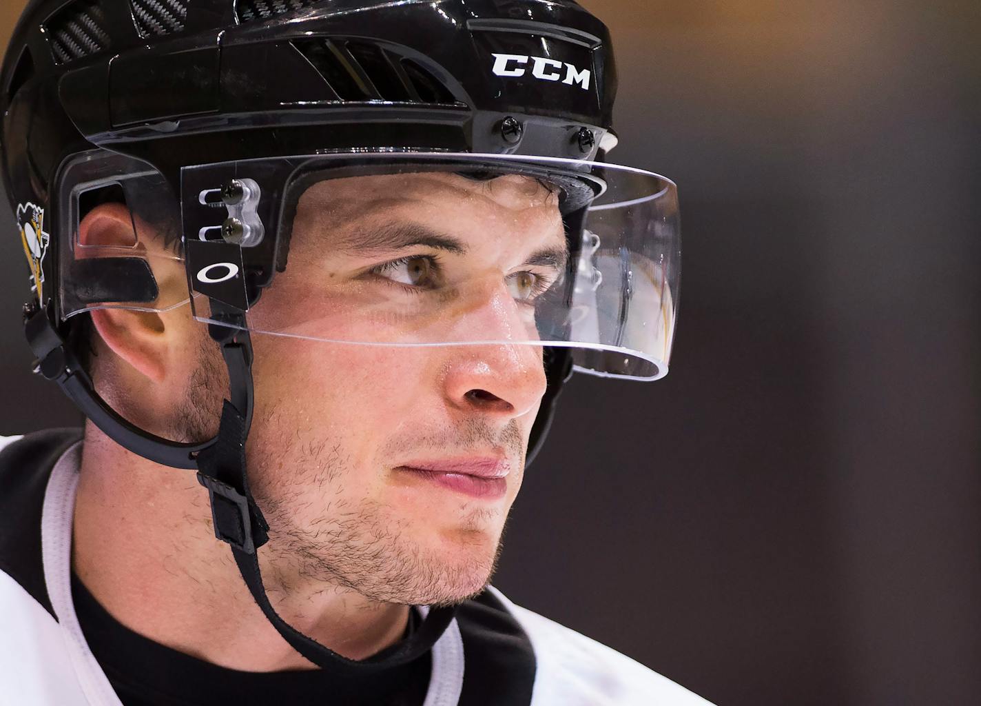 FILE - In this Sept. 26, 2016, file photo, Team Canada captain Sidney Crosby (87) looks up ice during a drill at practice ahead of the World Cup of Hockey finals in Toronto. Pittsburgh Penguins superstar Sidney Crosby has been diagnosed with another concussion and there is no timetable for his return. General manager Jim Rutherford made the announcement Monday, Oct. 10, 2016, as the team prepared for its regular-season opener Thursday night at home against Washington. (Nathan Denette/The Canadia