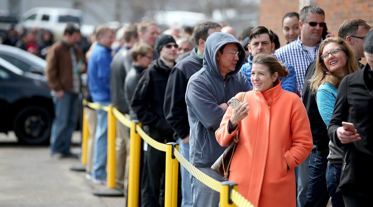 Car enthusiasts lined up outside Tesla in Eden Prairie, MN, Thursday March 31, 2016. They did this to get on a waiting list for the new Model 3 electric car. With a starting price of $35,000 before government incentives, the Model 3 is less than half the cost of Tesla's previous models. The car will be revealed Thursday night at its Los Angeles design studio. ] (ELIZABETH FLORES/STAR TRIBUNE) ELIZABETH FLORES &#x2022; eflores@startribune.com