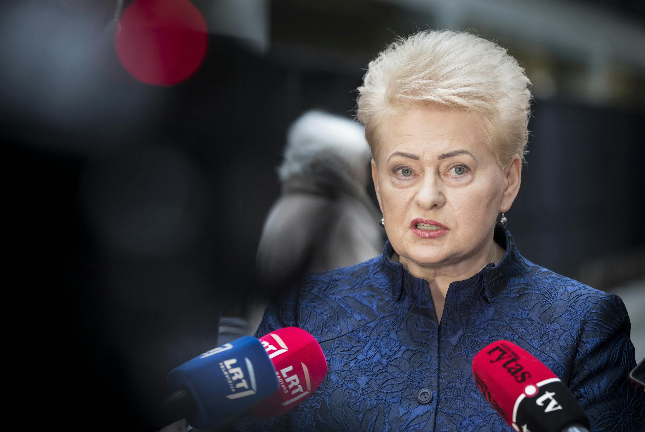 Lithuania's President Dalia Grybauskaite speaks to the members of press at a polling station during the advance presidential elections in Vilnius, Lithuania, Tuesday, May 7, 2019. Lithuanians will head to the polls on Sunday, May 12, in a first round of presidential elections. (AP Photo/Mindaugas Kulbis)