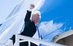 President Donald Trump boards Air Force One as he departs the G-7 summit meeting for Singapore, at Canadian Forces Base Bagotville in Quebec, Canada, 