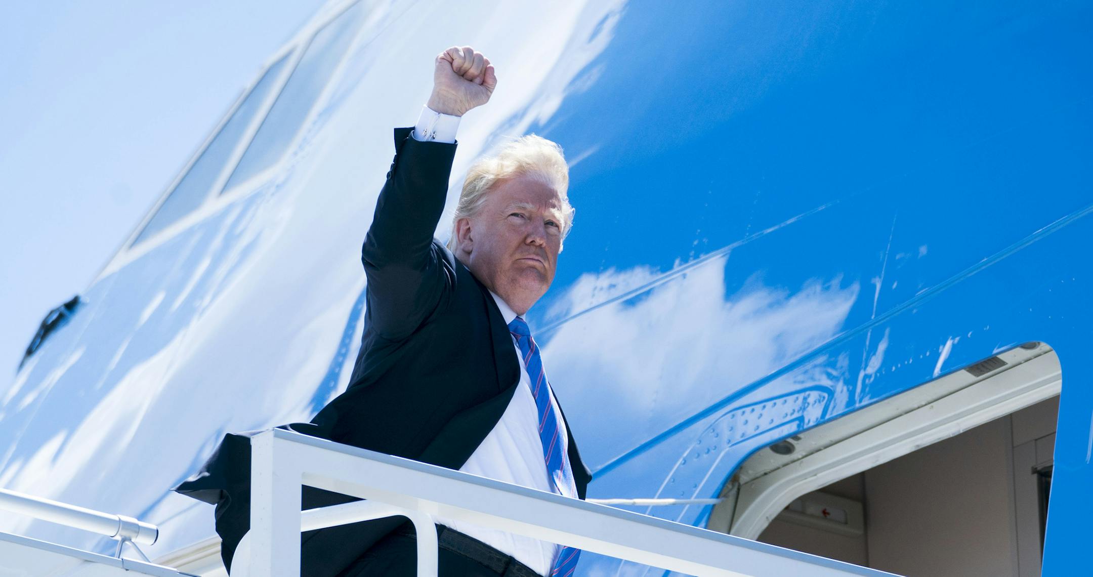 President Donald Trump boards Air Force One as he departs the G-7 summit meeting for Singapore, at Canadian Forces Base Bagotville in Quebec, Canada, June 9, 2018. (Doug Mills/The New York Times)