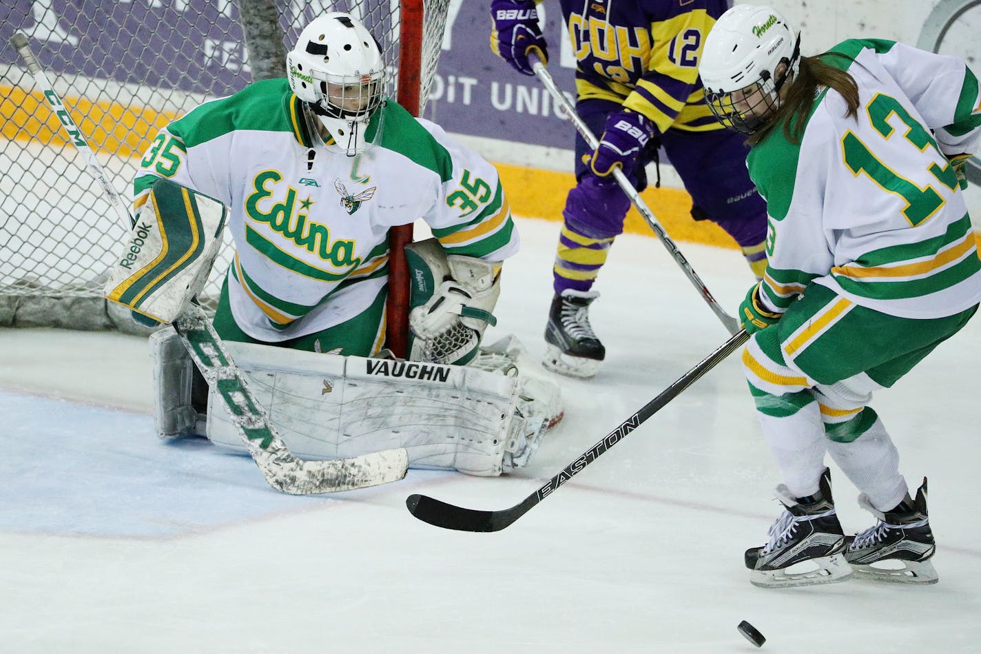 Edina's Grace Bowlby tries to clear the puck in front of goaltender Anna Goldstein in the third period. ] ANTHONY SOUFFLE &#xef; anthony.souffle@startribune.com Game action from a sectional finals girls prep hockey game between Edina High School and Cretin-Derham Hall Friday, Feb. 17, 2017 at Ridder Arena on the grounds of the University of Minnesota in Minneapolis.