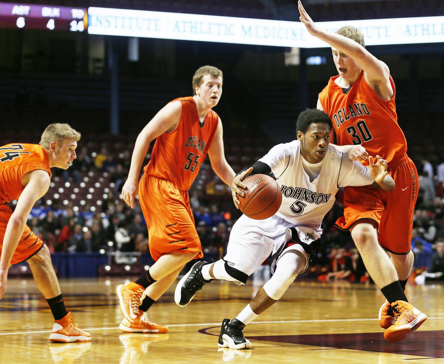 Q. Smith-Pugh of Johnson drove to the basket on Damon Longstreet of Delano during 3A quarterfinals basketball action between St. Paul Johnson and Delano at Williams Arena Wednesday March, 20, 2013 in Minneapolis, MN. Johnson beat Delano 64-65.] JERRY HOLT &#x201a;&#xc4;&#xa2; jerry.holt@startribune.com