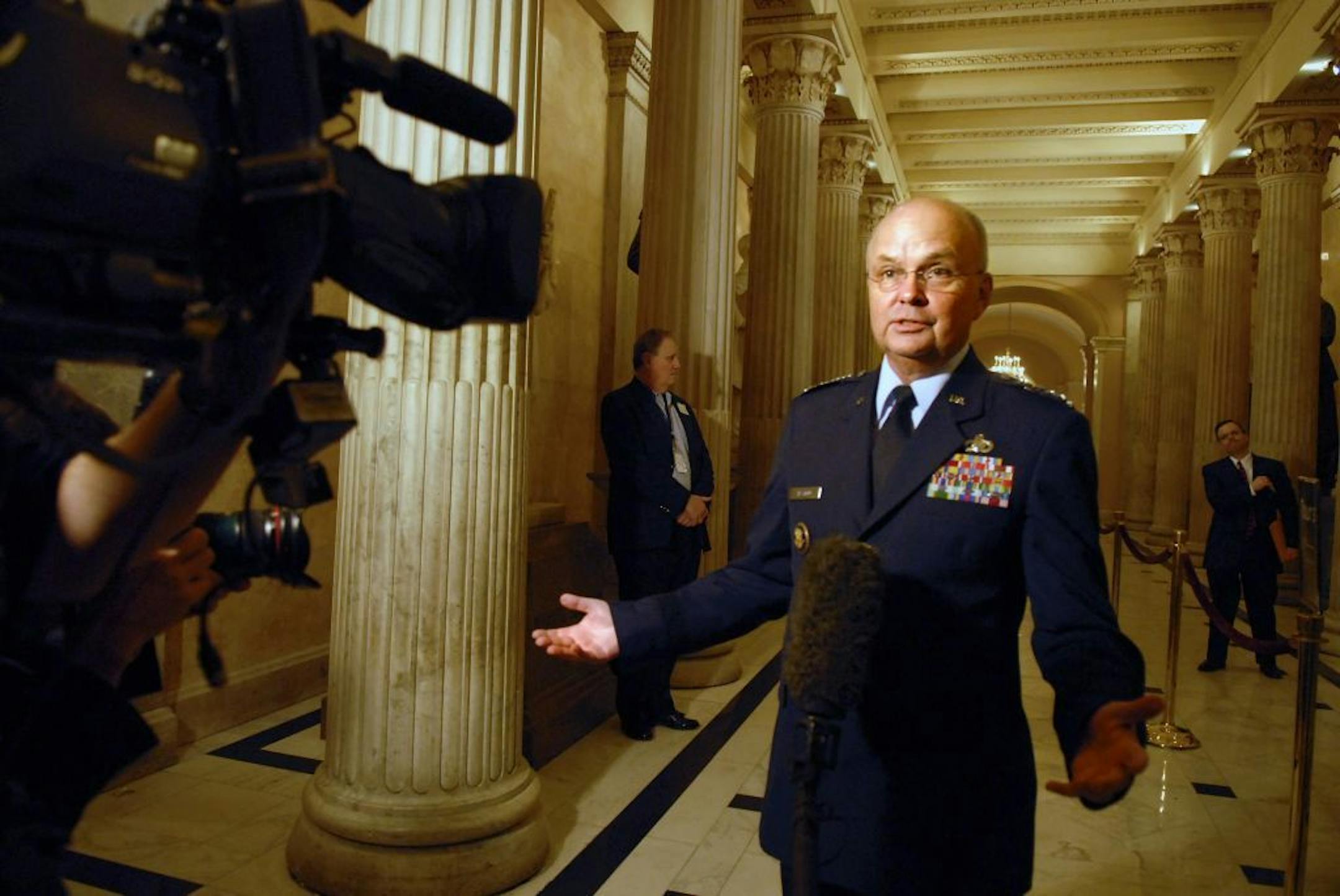 CIA Director Gen. Michael Hayden speaks to reporters on his way to a closed hearing before the House Intelligence Committee in Washington on Thrusday, Dec. 13, 2007. The panel has summoned the CIA official who ordered the destruction of interrogation videotapes, launching what will likely be several months of hearings.