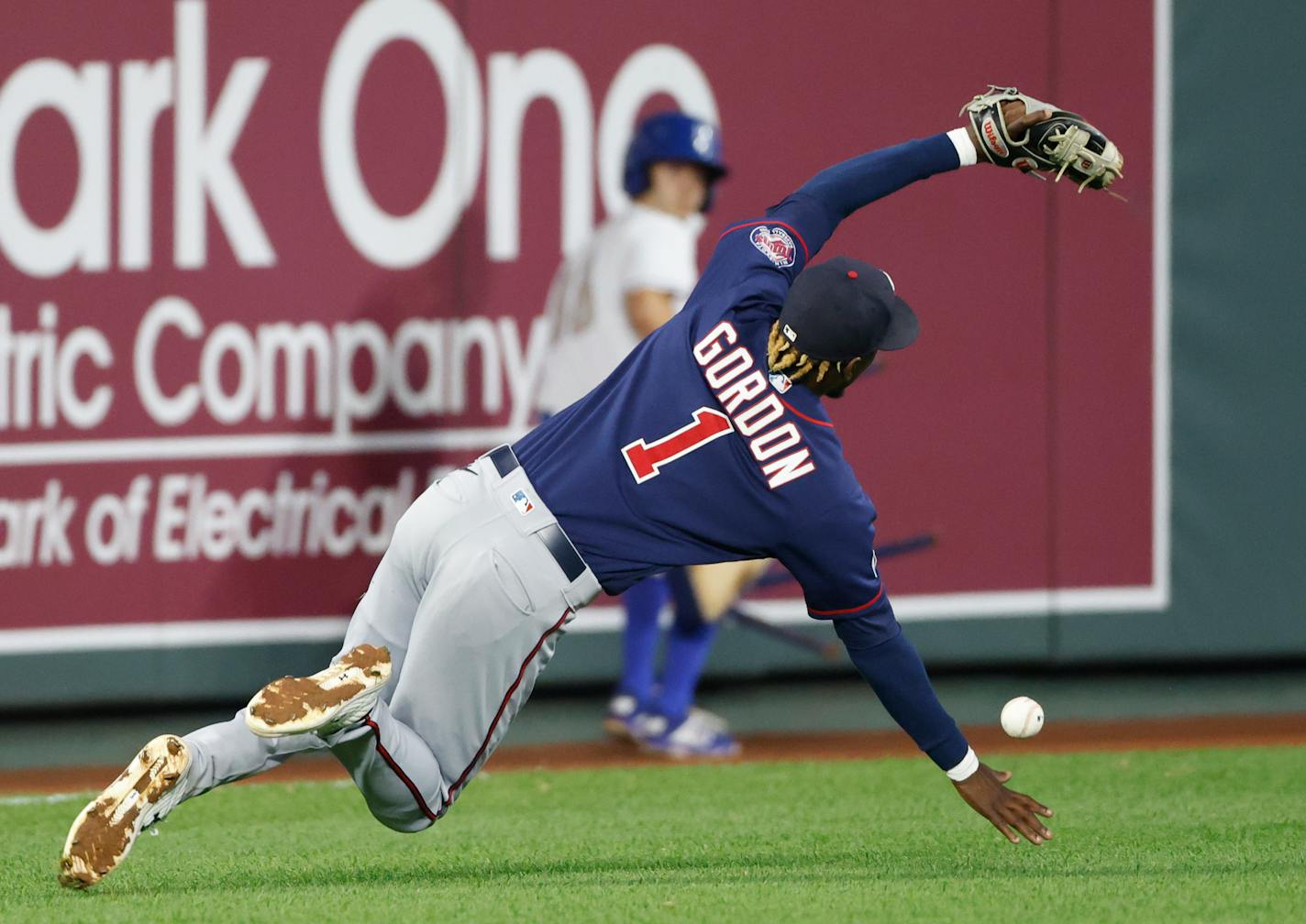 Minnesota Twins shortstop Nick Gordon (1) is unable to catch a short fly ball from Kansas City Royals' Andrew Benintendi during the fourth inning of a baseball game in Kansas City, Mo., Friday, Oct. 1, 2021. Benintendi doubled on the play. (AP Photo/Colin E. Braley)