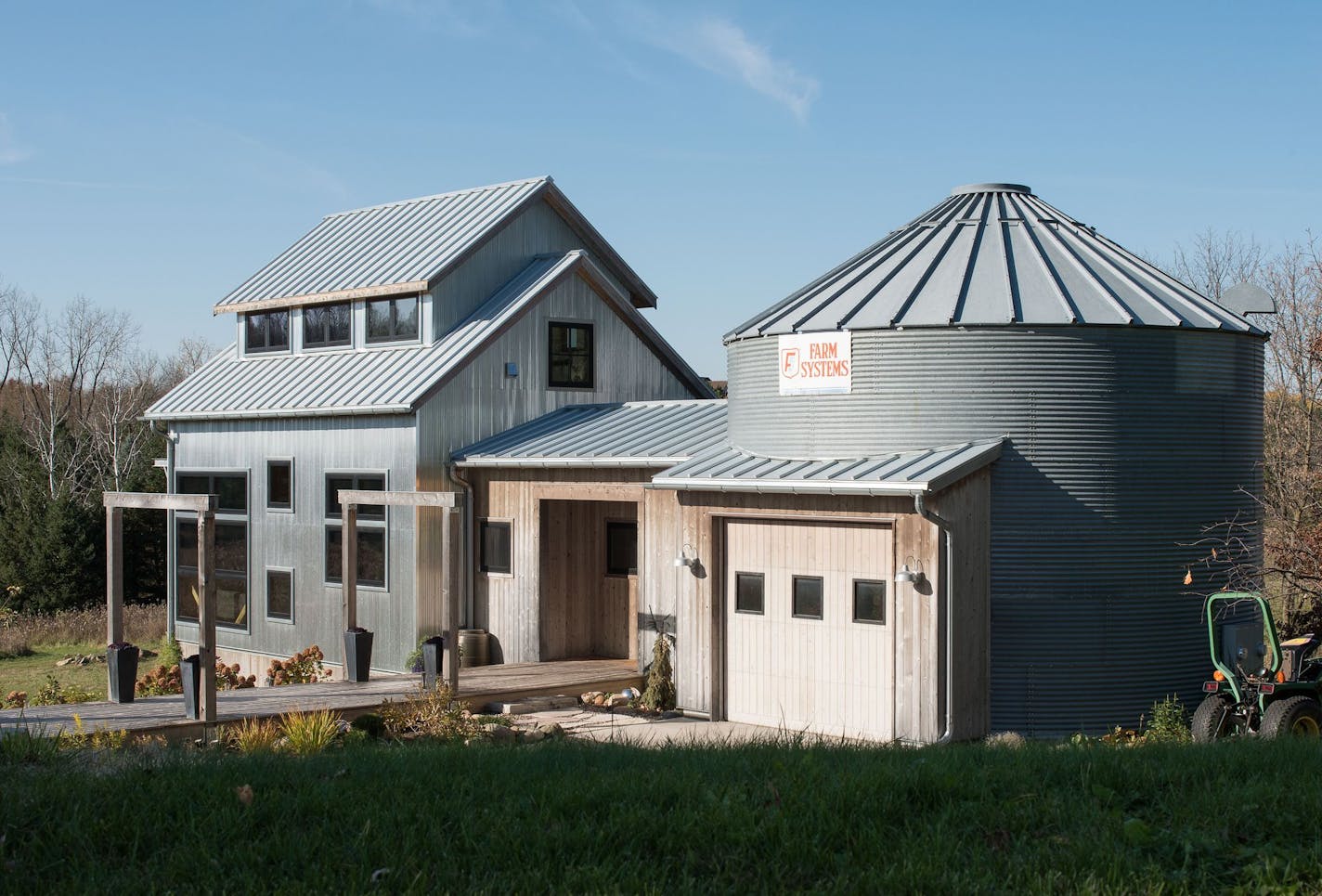 Home of the Month - Two farm granaries from different eras were turned into a modern multi-functional home on an old farmstead, designed by Rehkamp Larson Architects.