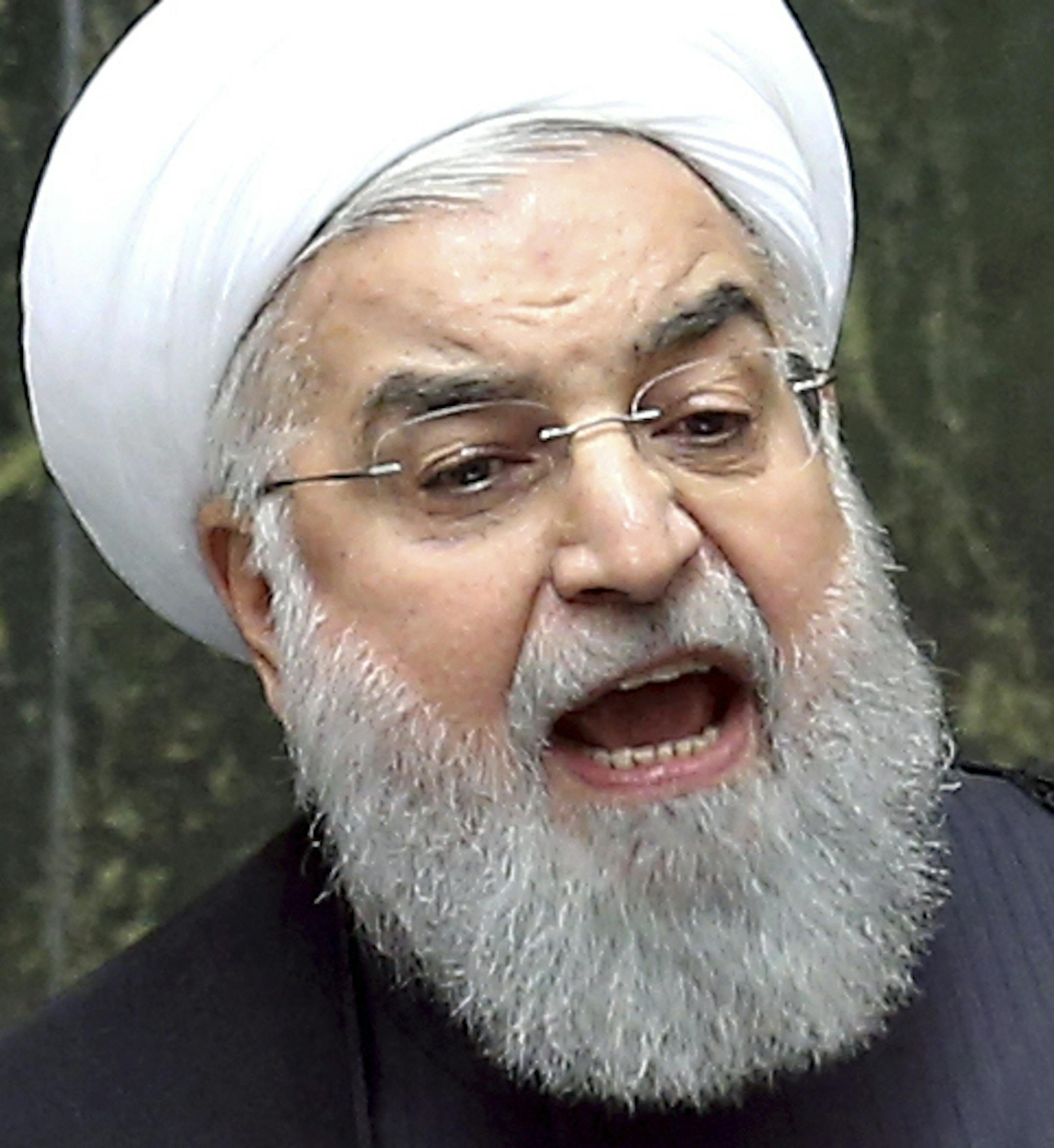 Iranian President Hassan Rouhani speaks during parliament's open session on confidence vote for four new ministers, in Tehran, Iran, Saturday, Oct. 27, 2018. Rouhani urged Parliament to approve four new ministers and help his government "resist" and "fight" the U.S. as it reinstates sanctions against the Islamic Republic. (AP Photo/Ebrahim Noroozi) ORG XMIT: ENO107