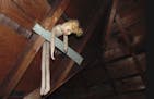Workers for Structure Tech Home Inspections found this creepy doll hanging in an attic.