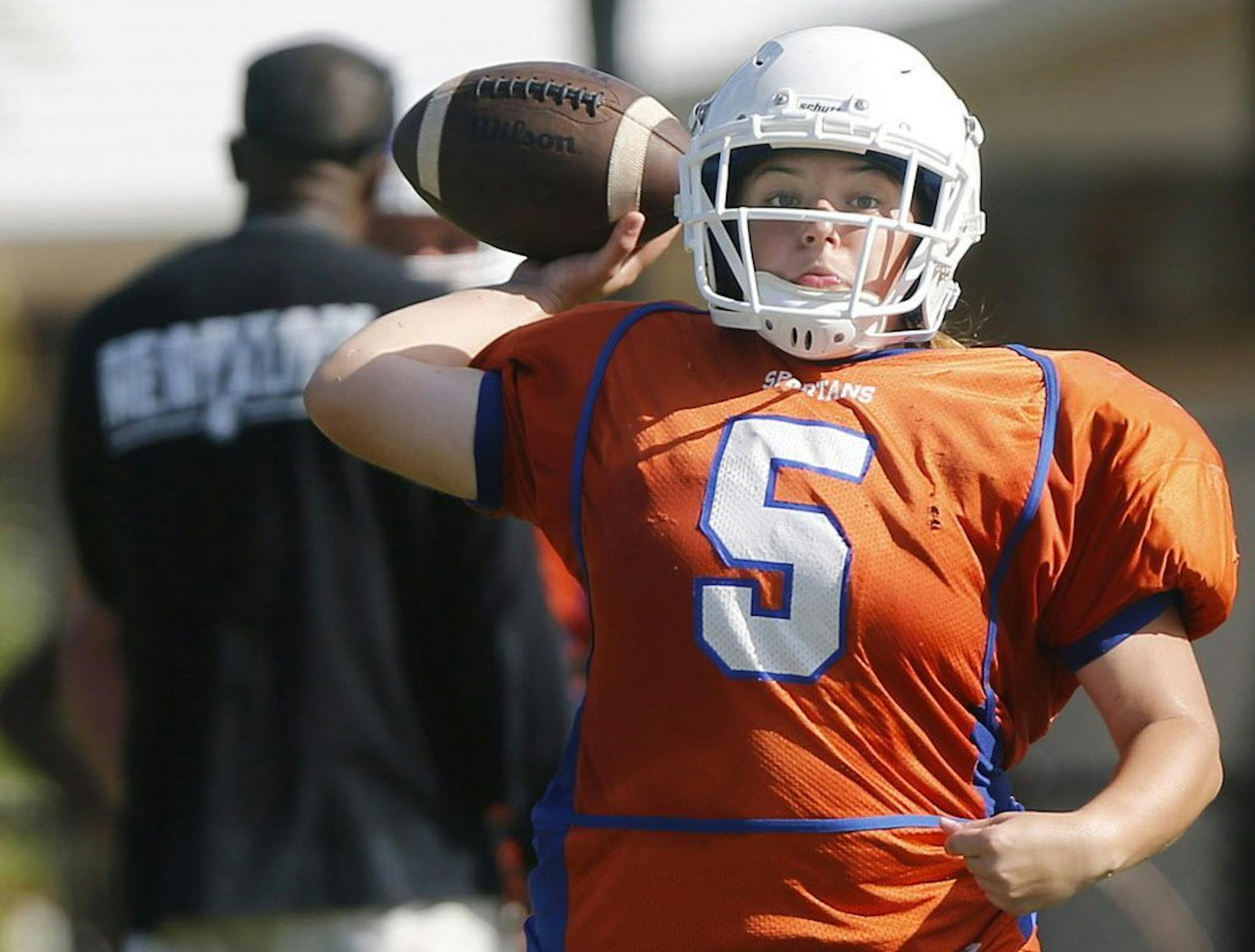 Hollywood Hills quarterback Holly Neher, 16, prepares for a pass during a scrimmage game.