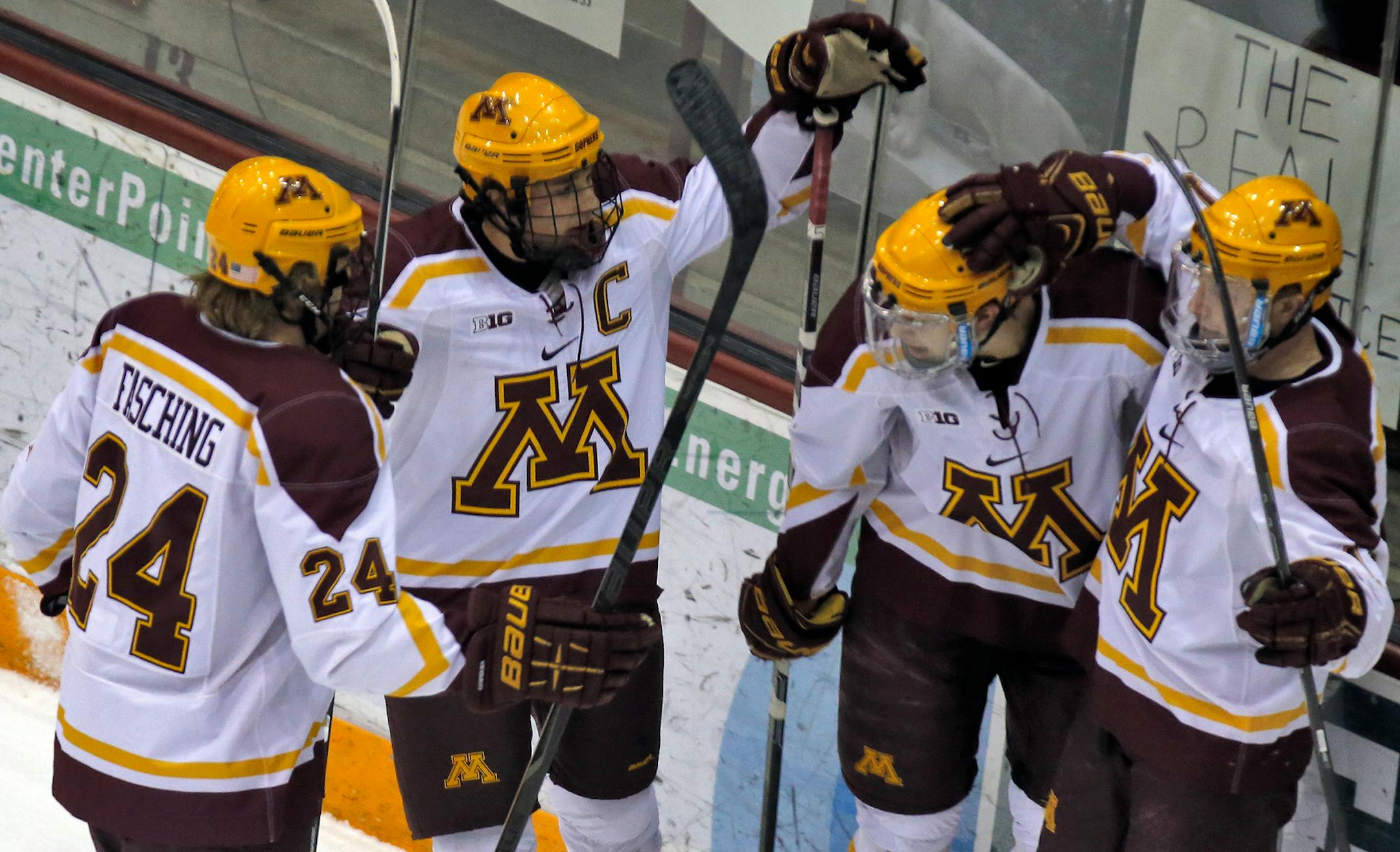 Gophers celebrated Kyle Rau's goal in first period action.