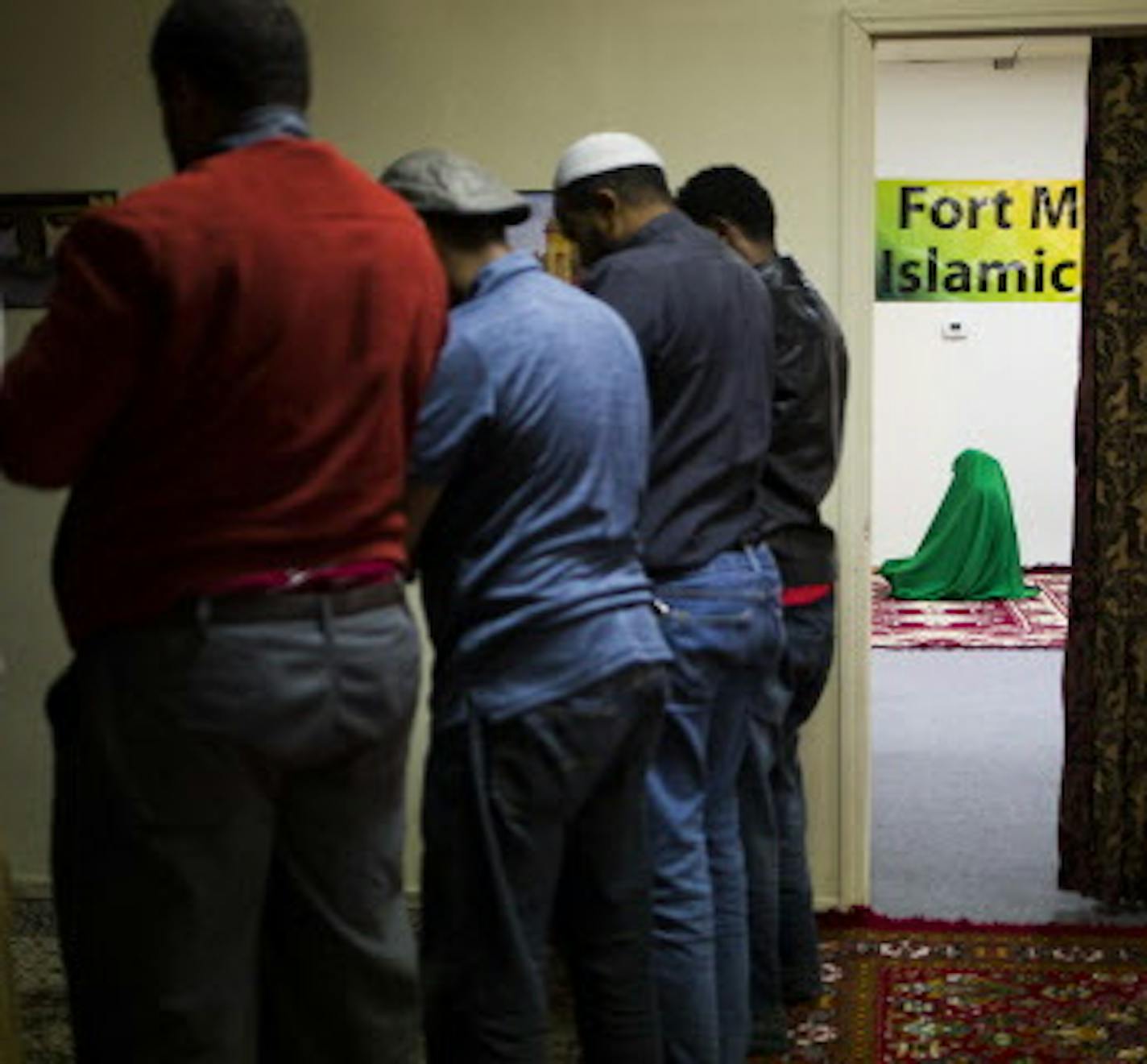 Muslims praying at the Islamic Center in Fort Morgan, Colo., Feb. 27, 2016. After top managers said that religious breaks would be severely curtailed, dozens of employees walked out of the Cargill Meat Solutions plant in December thrusting the livelihoods and the fate of a business into limbo. (Nick Cote/The New York Times)