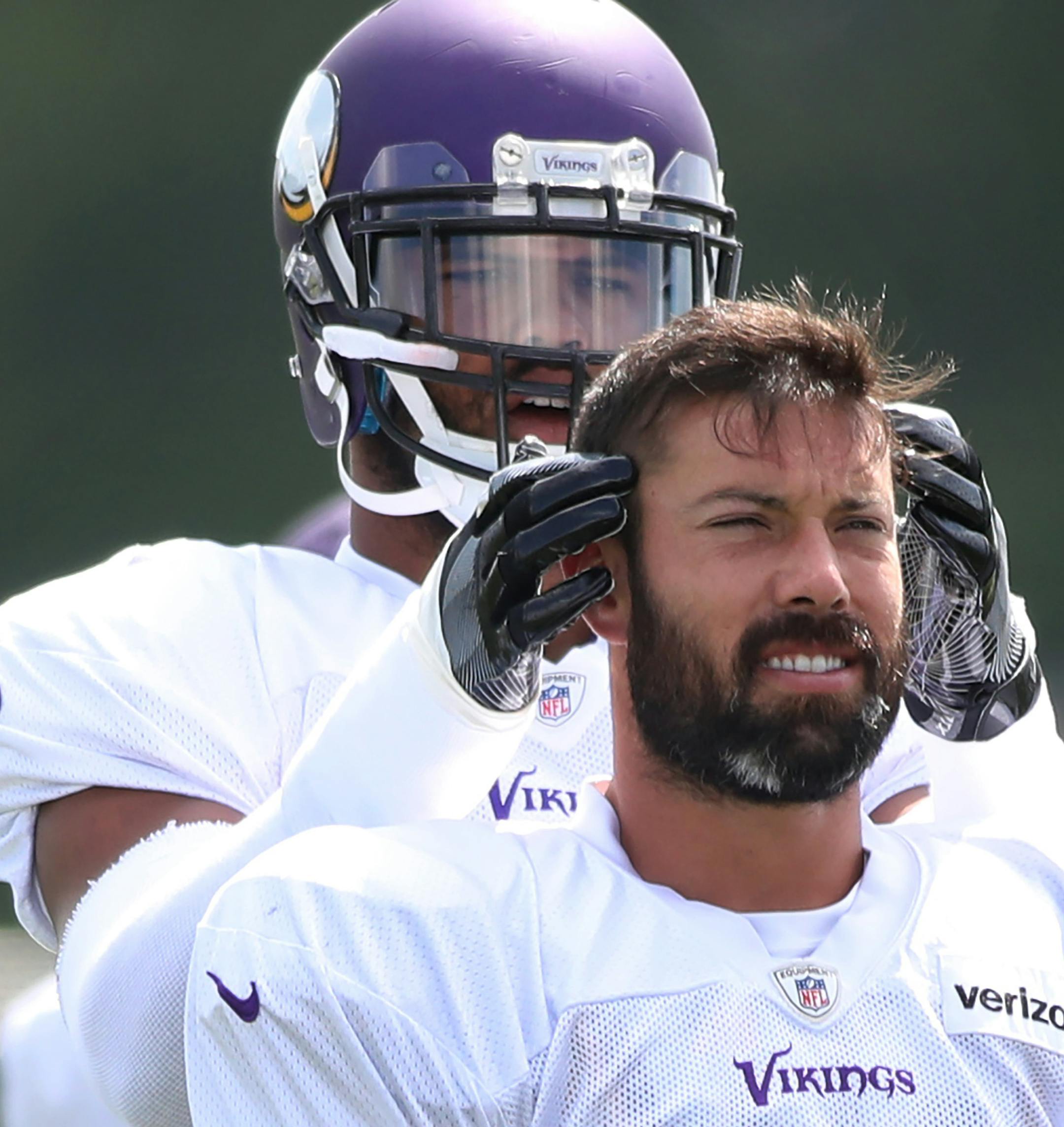 Minnesota Vikings outside linebacker Anthony Barr (55) left put his hands on strong safety Andrew Sendejo (34) head during practice at Minnesota State University, Mankato Monday August 7, 2017 in Mankato, MN. ] JERRY HOLT &#xef; jerry.holt@startribune.com